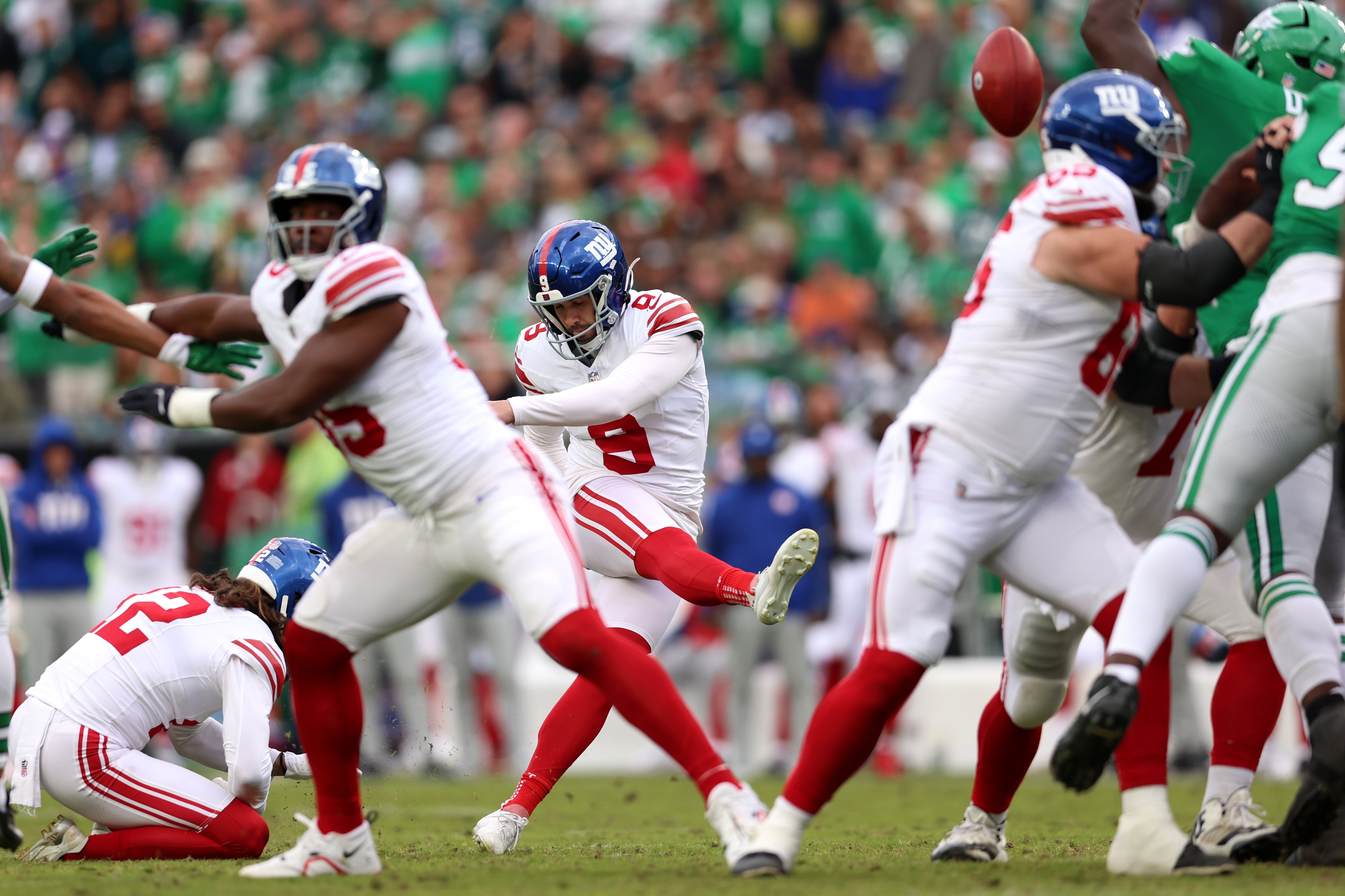 Oct 26, 2025; Philadelphia, Pennsylvania, USA; New York Giants place kicker Graham Gano (9) kicks a field goal against the Philadelphia Eagles in the third quarter at Lincoln Financial Field.
