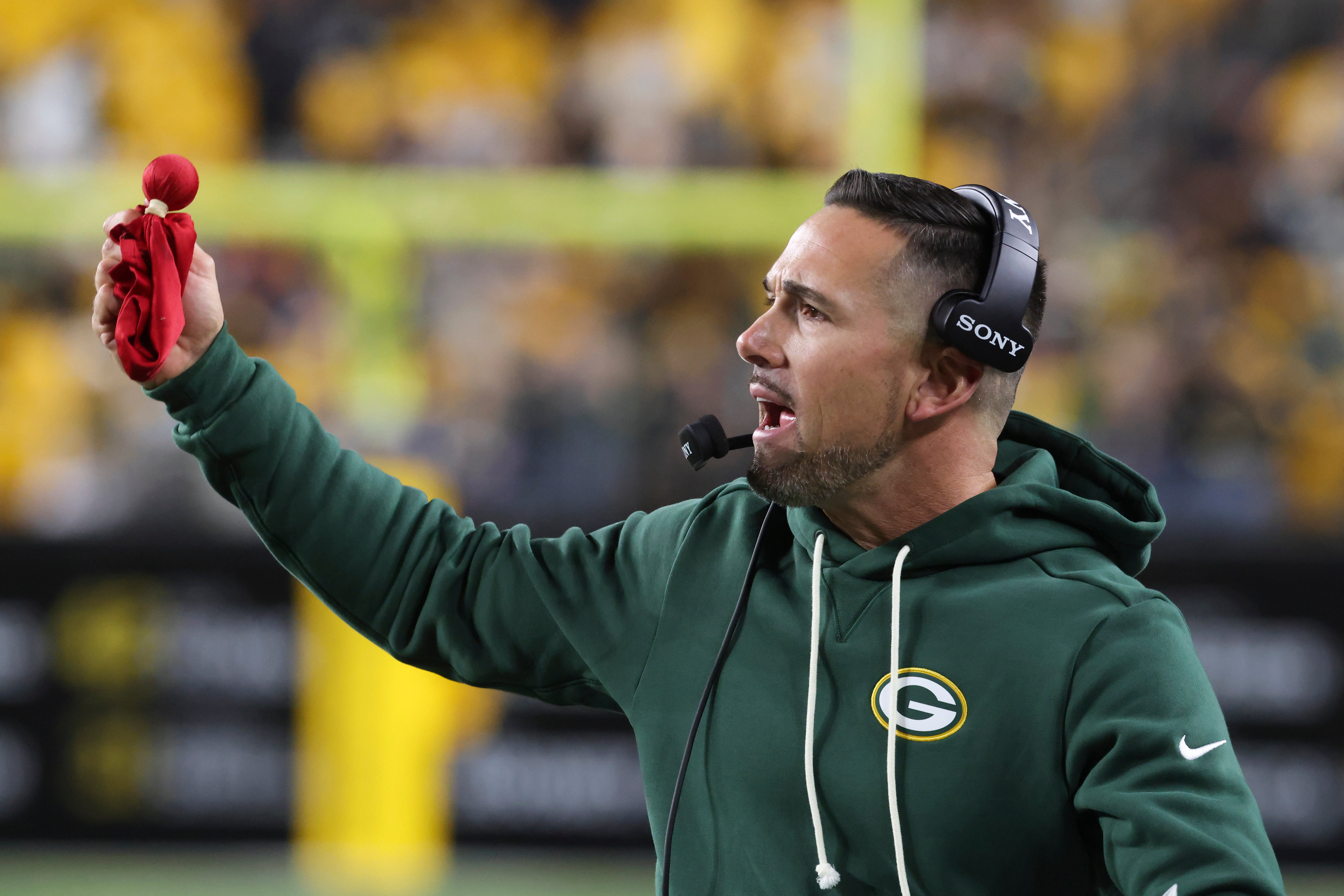 Oct 26, 2025; Pittsburgh, Pennsylvania, USA; Green Bay Packers head coach Matt LaFleur challenges the call during the fourth quarter against the Pittsburgh Steelers at Acrisure Stadium.