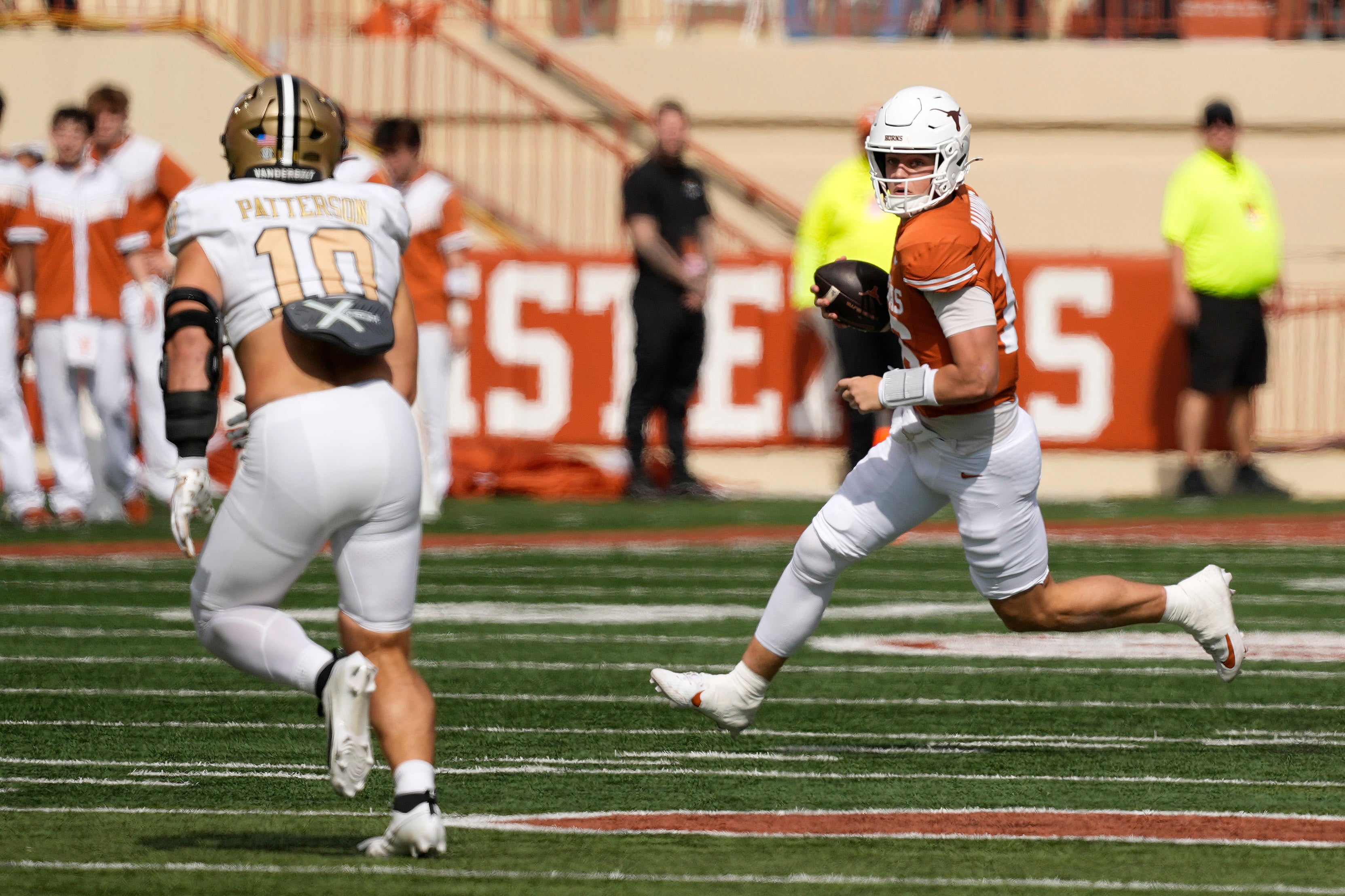 Nov 1, 2025; Austin, Texas, USA; Texas Longhorns quarterback Arch Manning (16) runs the ball during the first half against the Vanderbilt Commodores at Darrell K Royal-Texas Memorial Stadium. Mandatory Credit: Scott Wachter-Imagn Images