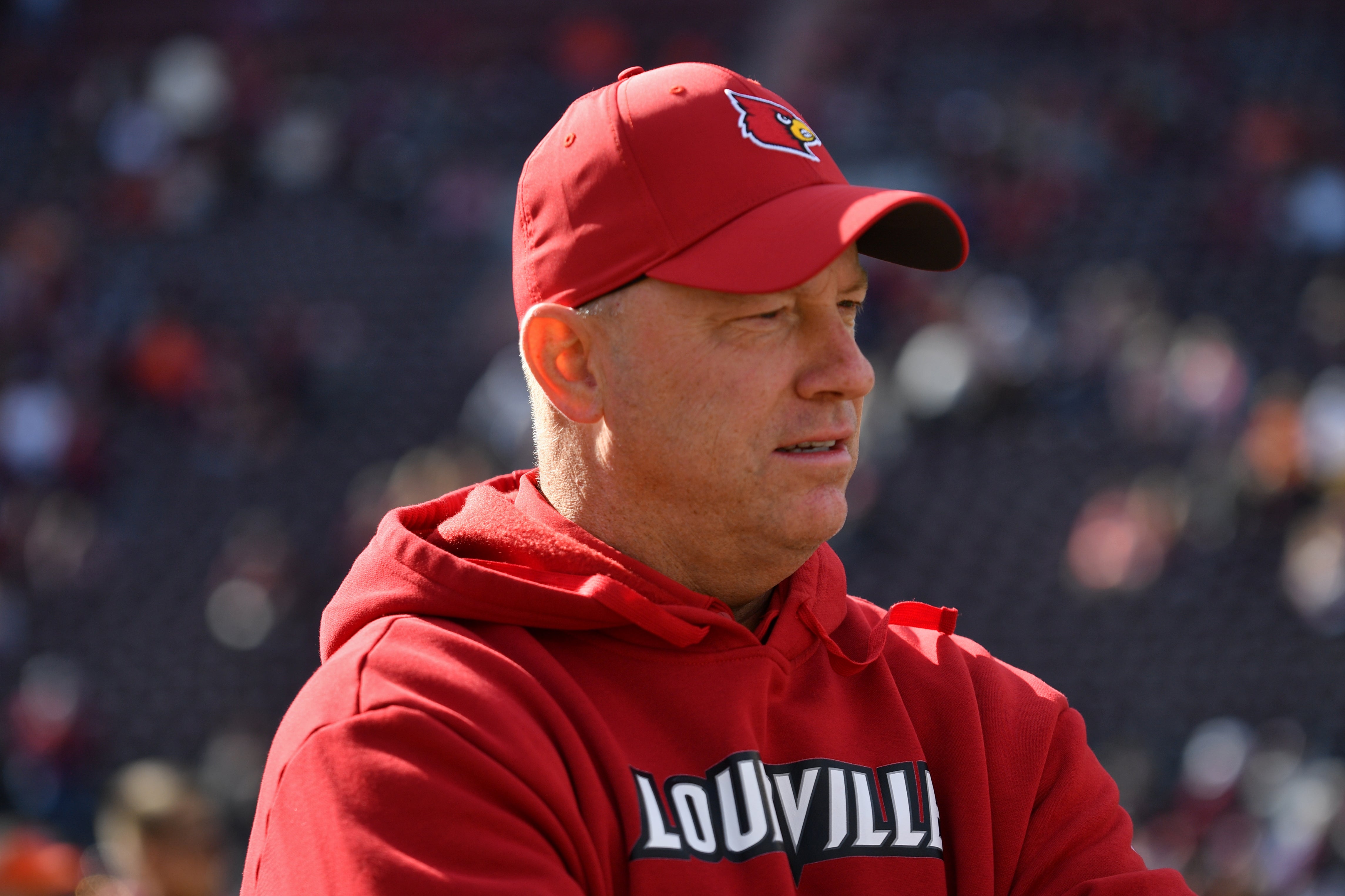 Nov 1, 2025; Blacksburg, Virginia, USA; Louisville Cardinals head coach Jeff Brohm looks on before the game against the Virginia Tech Hokies at Lane Stadium. Mandatory Credit: Brian Bishop-Imagn Images