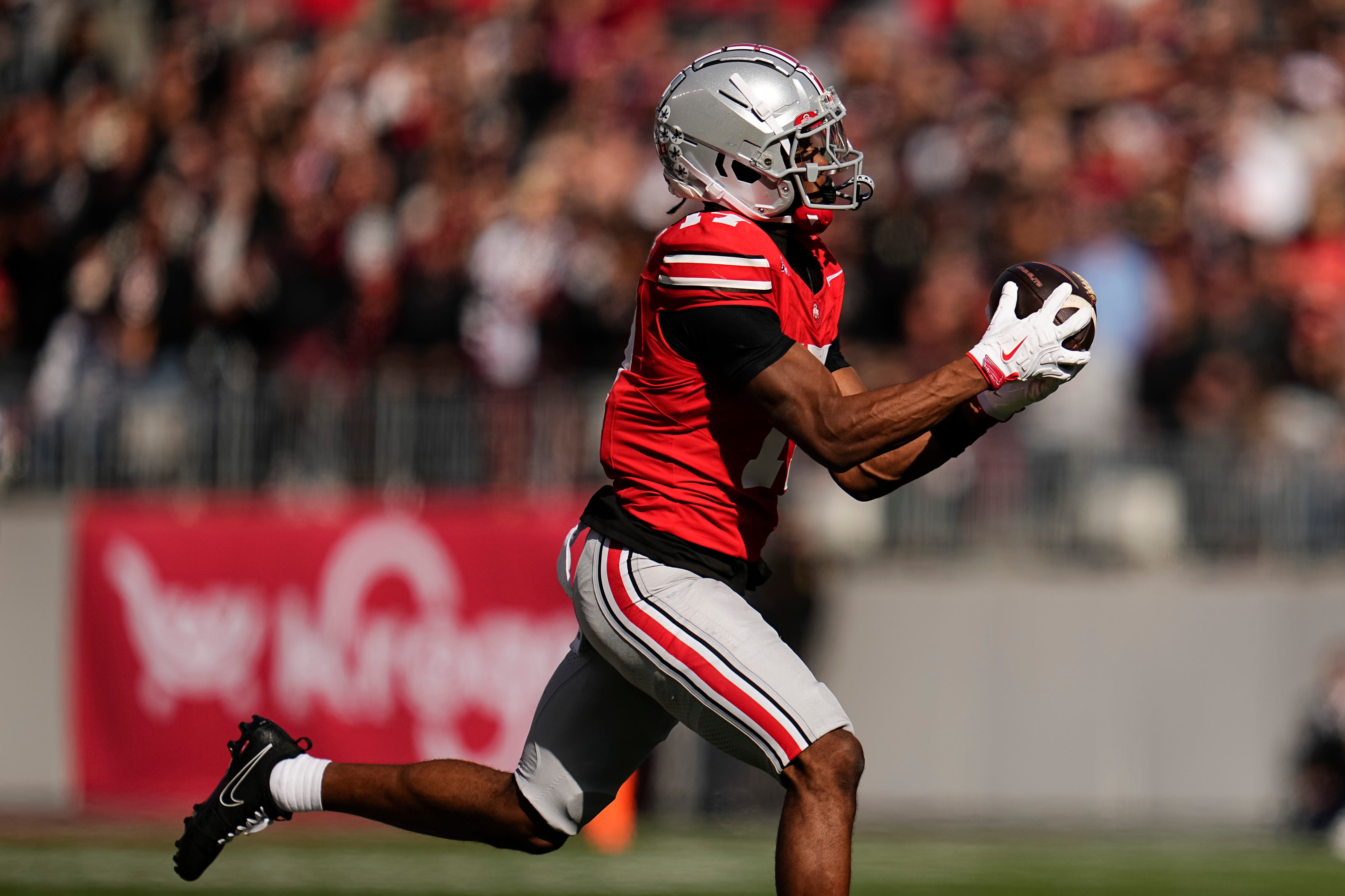 Ohio State Buckeyes wide receiver Carnell Tate (17) catches a pass during the NCAA football game against the Penn State Nittany Lions at Ohio Stadium in Columbus on Nov. 1, 2025.