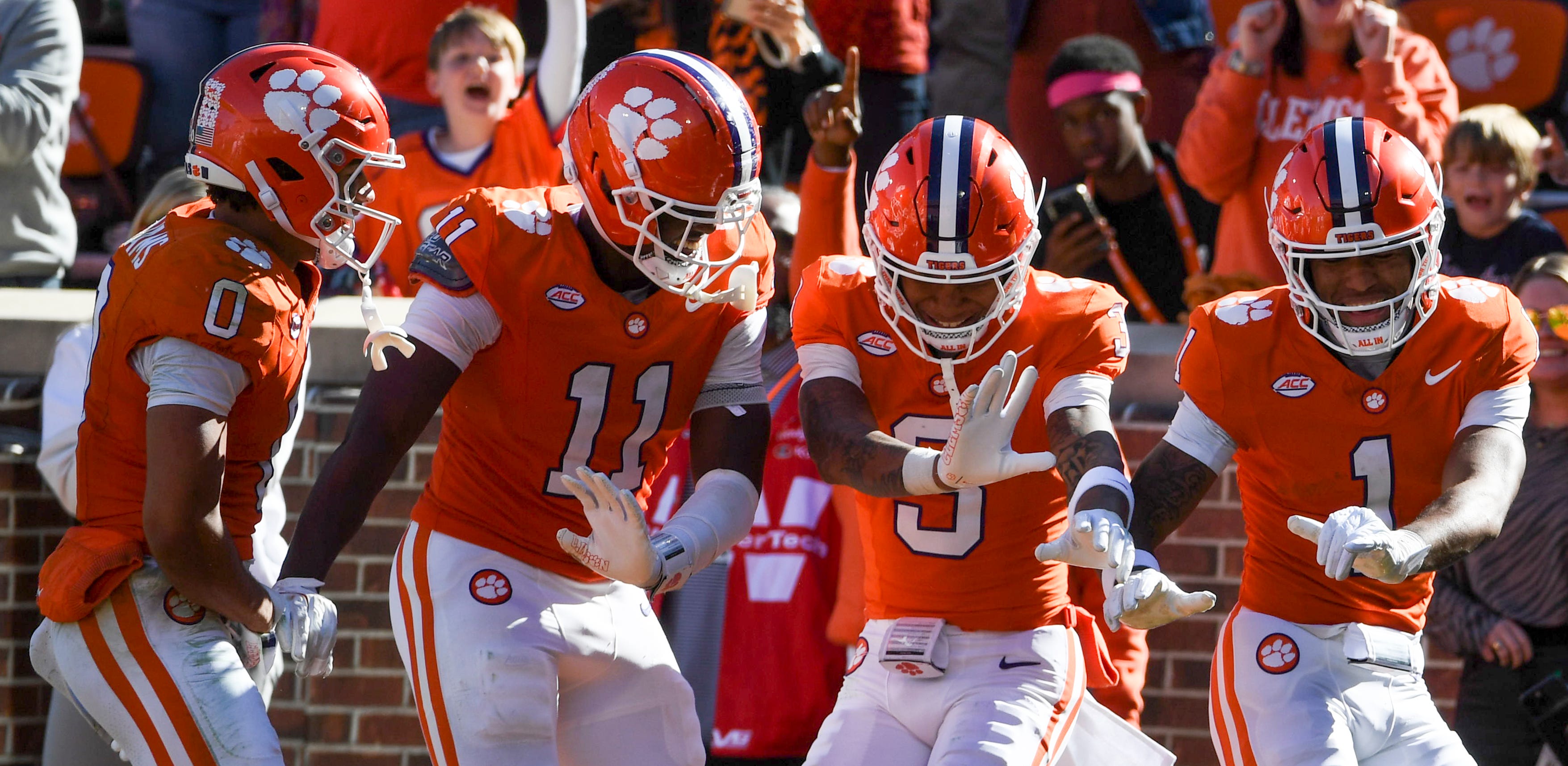Clemson Tigers wide receiver T.J. Moore (1) celebrates with Clemson Tigers wide receiver Antonio Williams (0), Clemson Tigers tight end Olsen Patt-Henry (11) and Clemson Tigers wide receiver Tristan Smith (3) after scoring a touchdown Saturday, Nov. 1, 2025, during the NCAA football game against the Duke Blue Devils at Memorial Stadium in Clemson, South Carolina.