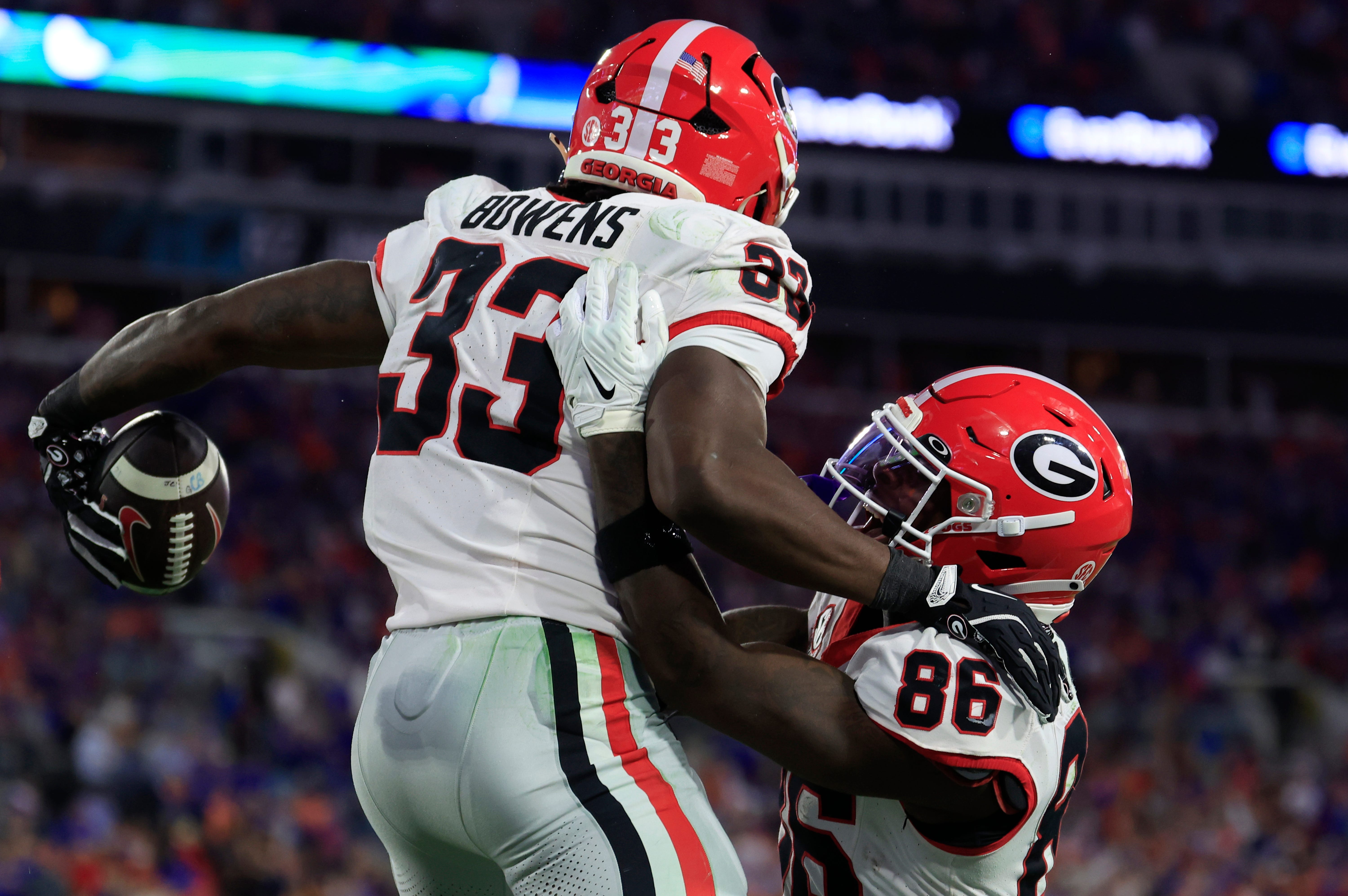 Georgia Bulldogs running back Chauncey Bowens (33) is congratulated by wide receiver Dillon Bell (86) for his touchdown score during the fourth quarter of an NCAA football game, Saturday, Nov. 1, 2025.