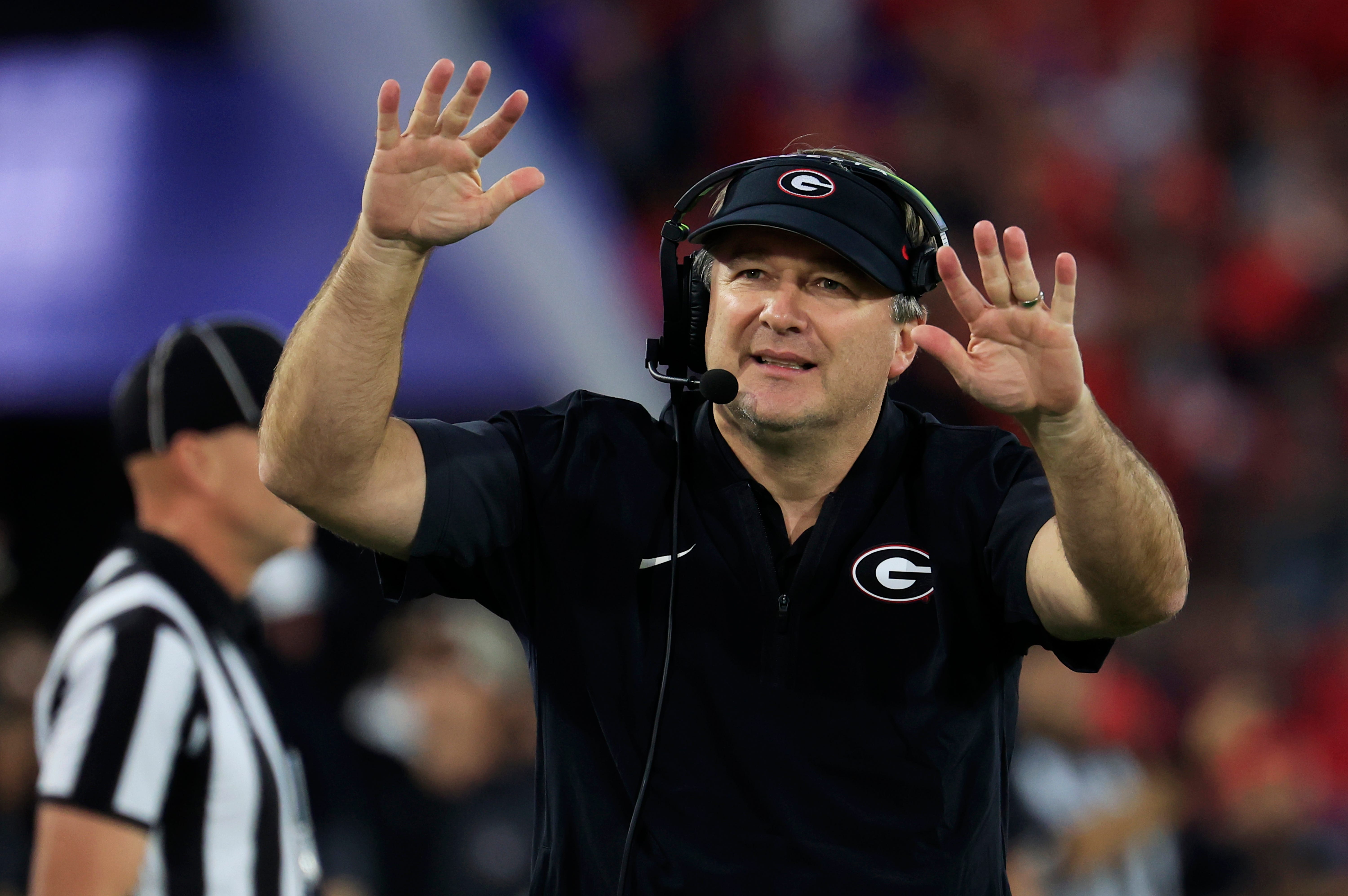Georgia Bulldogs head coach Kirby Smart tells the students section to calm down during the fourth quarter of an NCAA football game, Saturday, Nov. 1, 2025, at EverBank Stadium in Jacksonville, Fla.