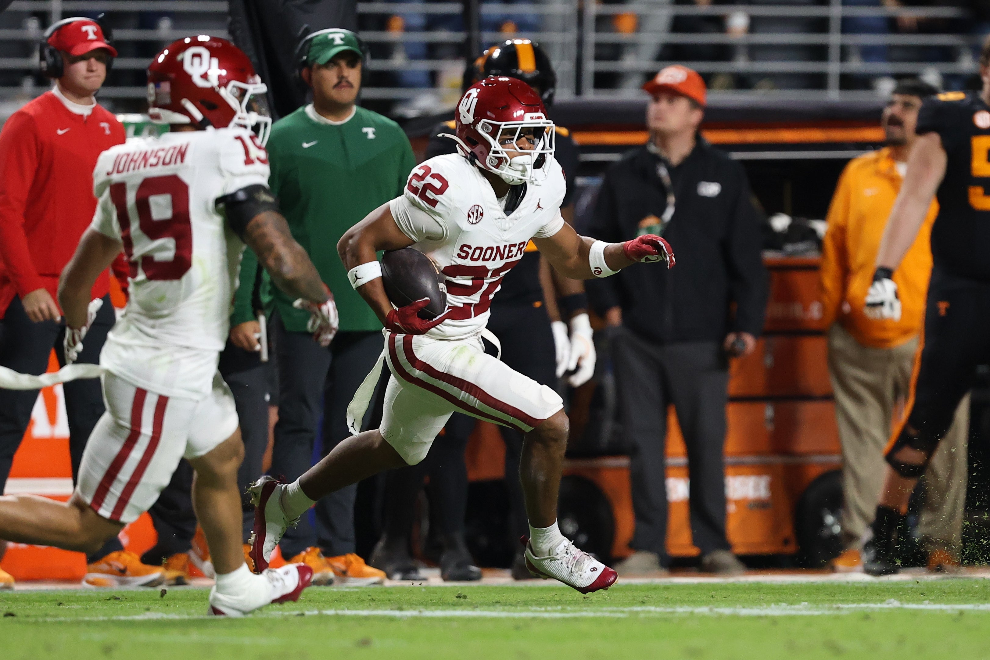 Nov 1, 2025; Knoxville, Tennessee, USA; Oklahoma Sooners defensive back Peyton Bowen (22) runs an interception back against the Tennessee Volunteers during the second quarter at Neyland Stadium.