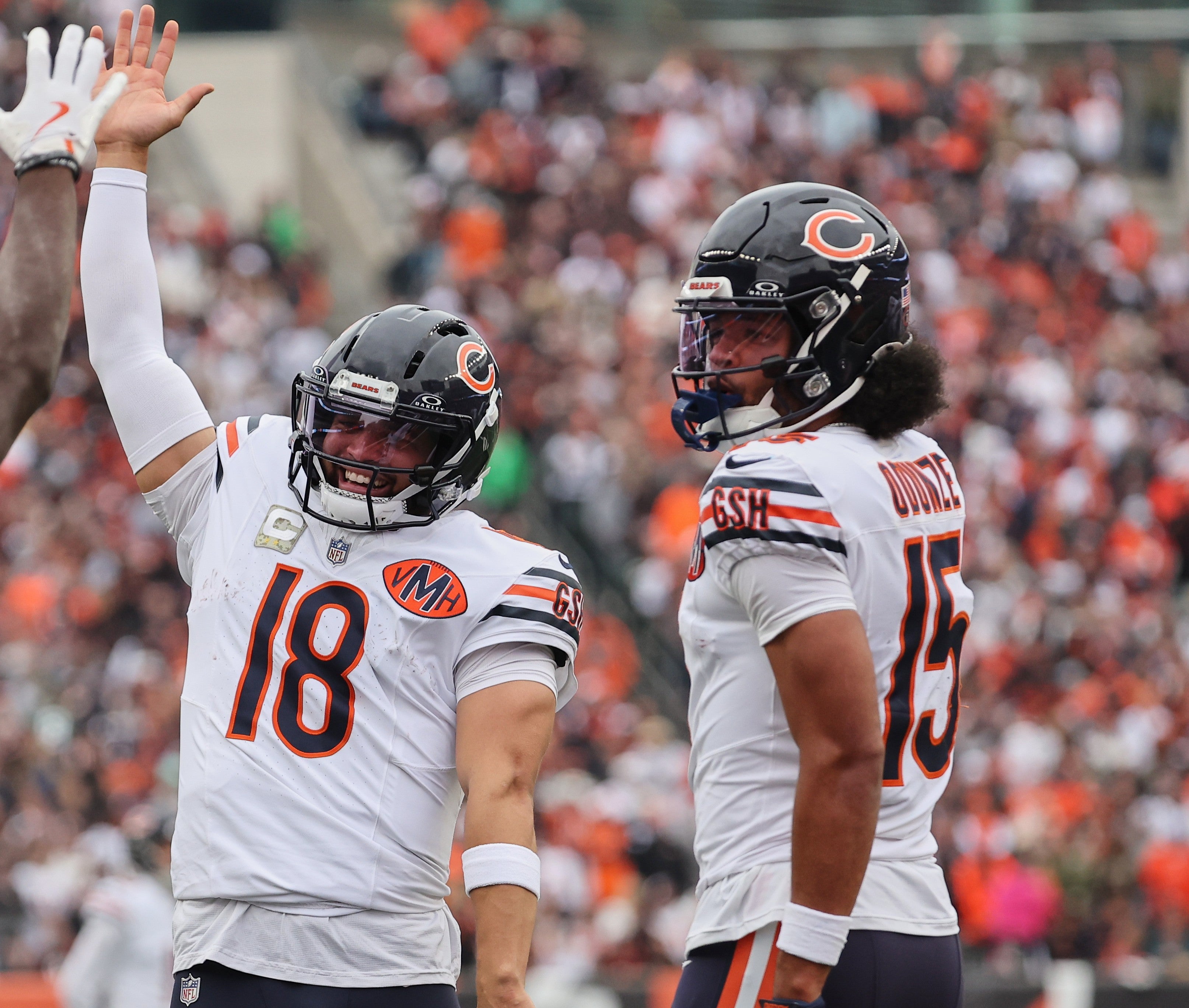 Nov 2, 2025; Cincinnati, Ohio, USA; Chicago Bears quarterback Caleb Williams (18) celebrates with wide receiver Rome Odunze (15) after a Bears touchdown against the Cincinnati Bengals during the second quarter at Paycor Stadium.