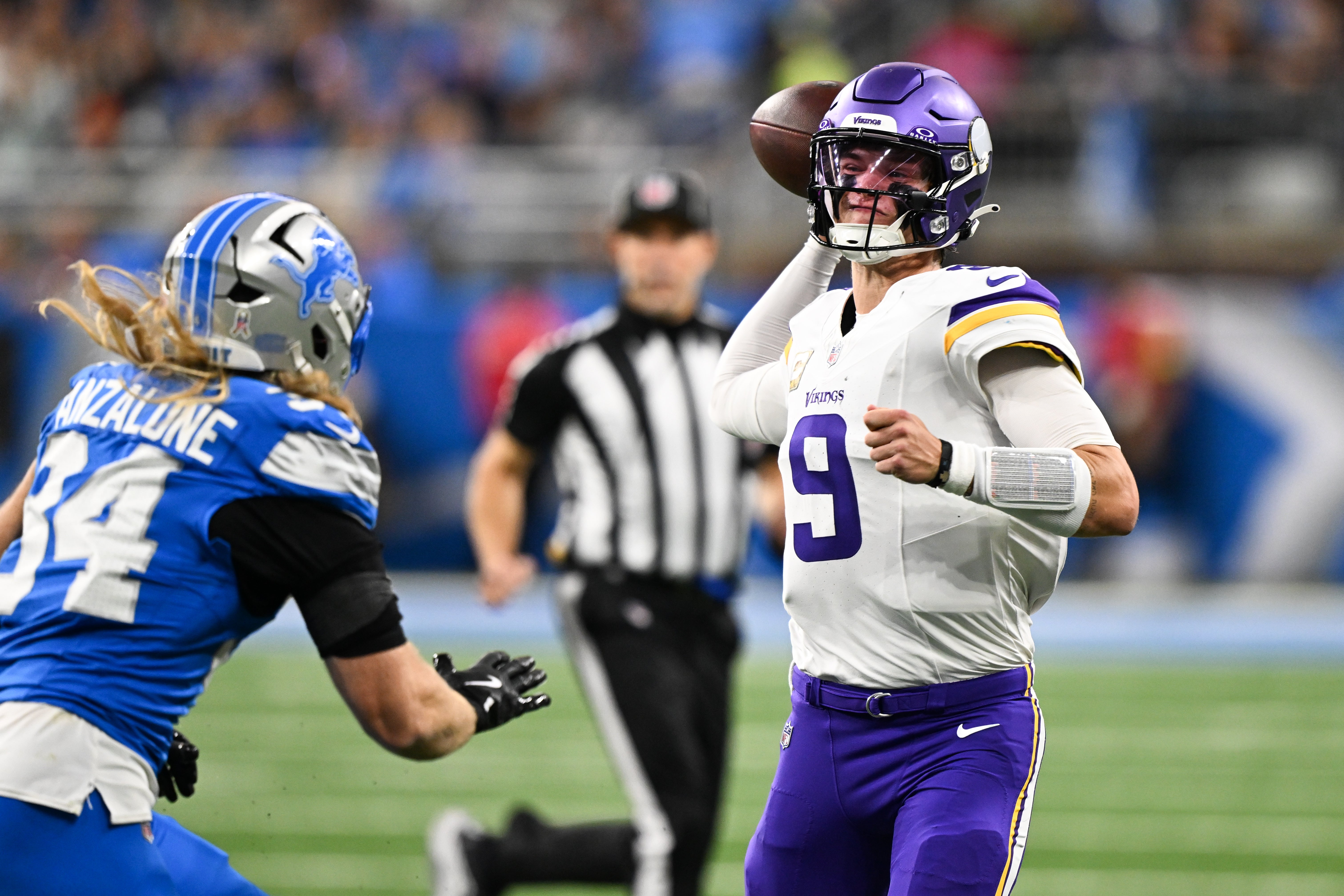 Nov 2, 2025; Detroit, Michigan, USA; Minnesota Vikings quarterback J.J. McCarthy (9) throws the ball during the first quarter against the Minnesota Vikings at Ford Field.