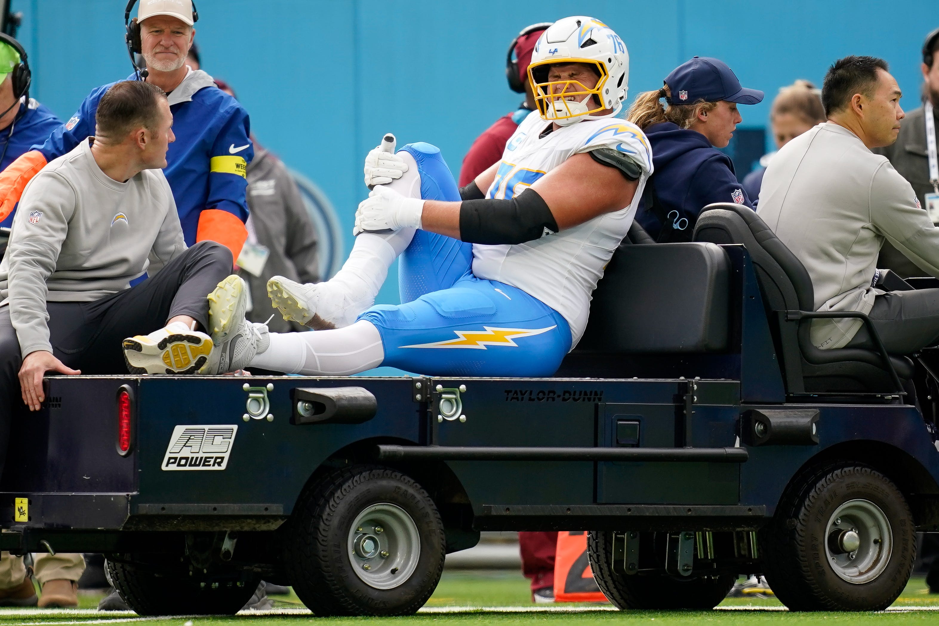 Los Angeles Chargers offensive tackle Joe Alt (76) is carted off after an injury during the second quarter against the Tennessee Titans at Nissan Stadium in Nashville, Tenn., Sunday, Nov. 2, 2025.