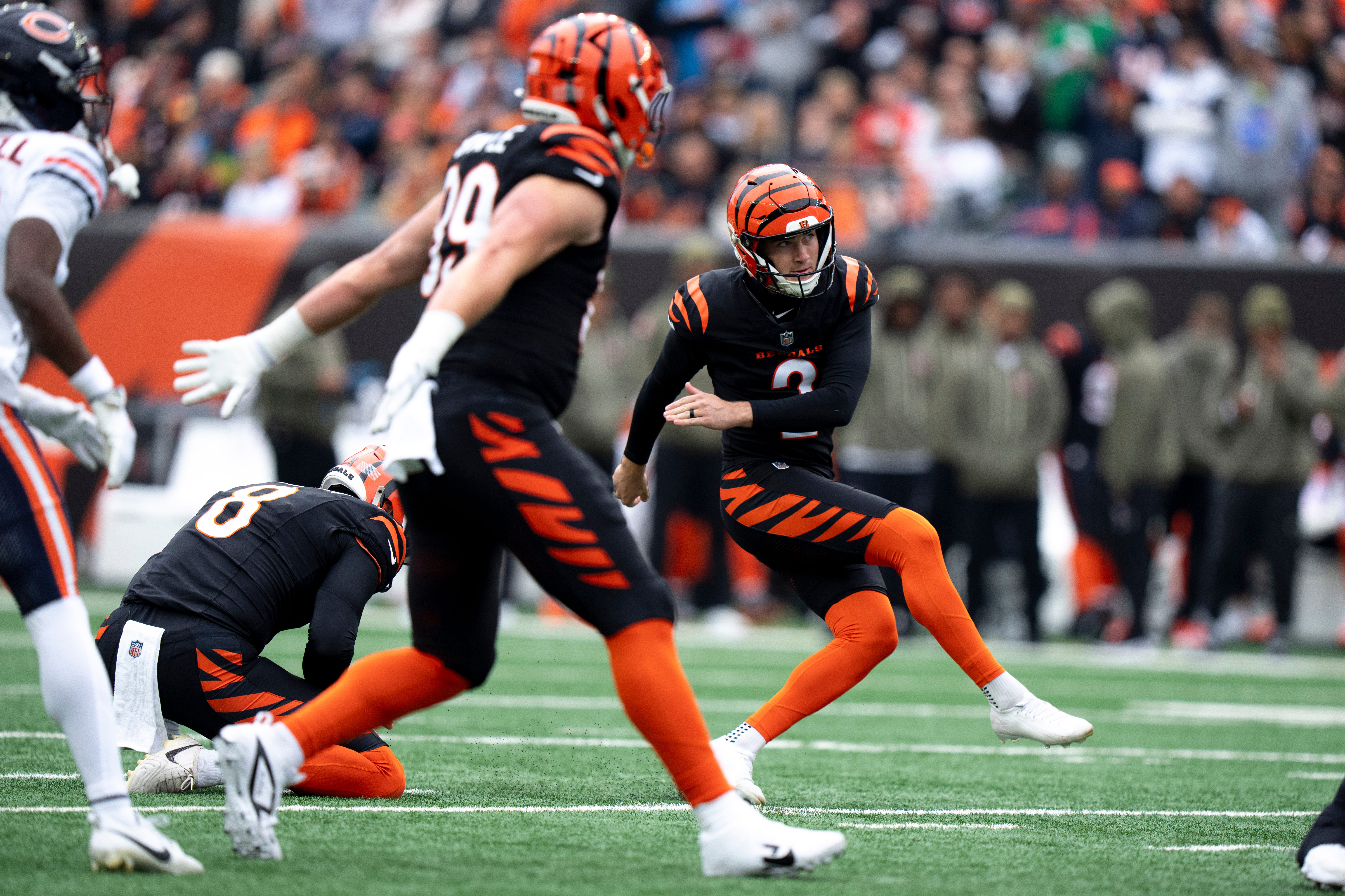 Cincinnati Bengals place kicker Evan McPherson (2) hits a field goal in the first quarter of the NFL football game between Chicago Bears and Cincinnati Bengals at Paycor Stadium in Cincinnati on Nov. 2, 2025.