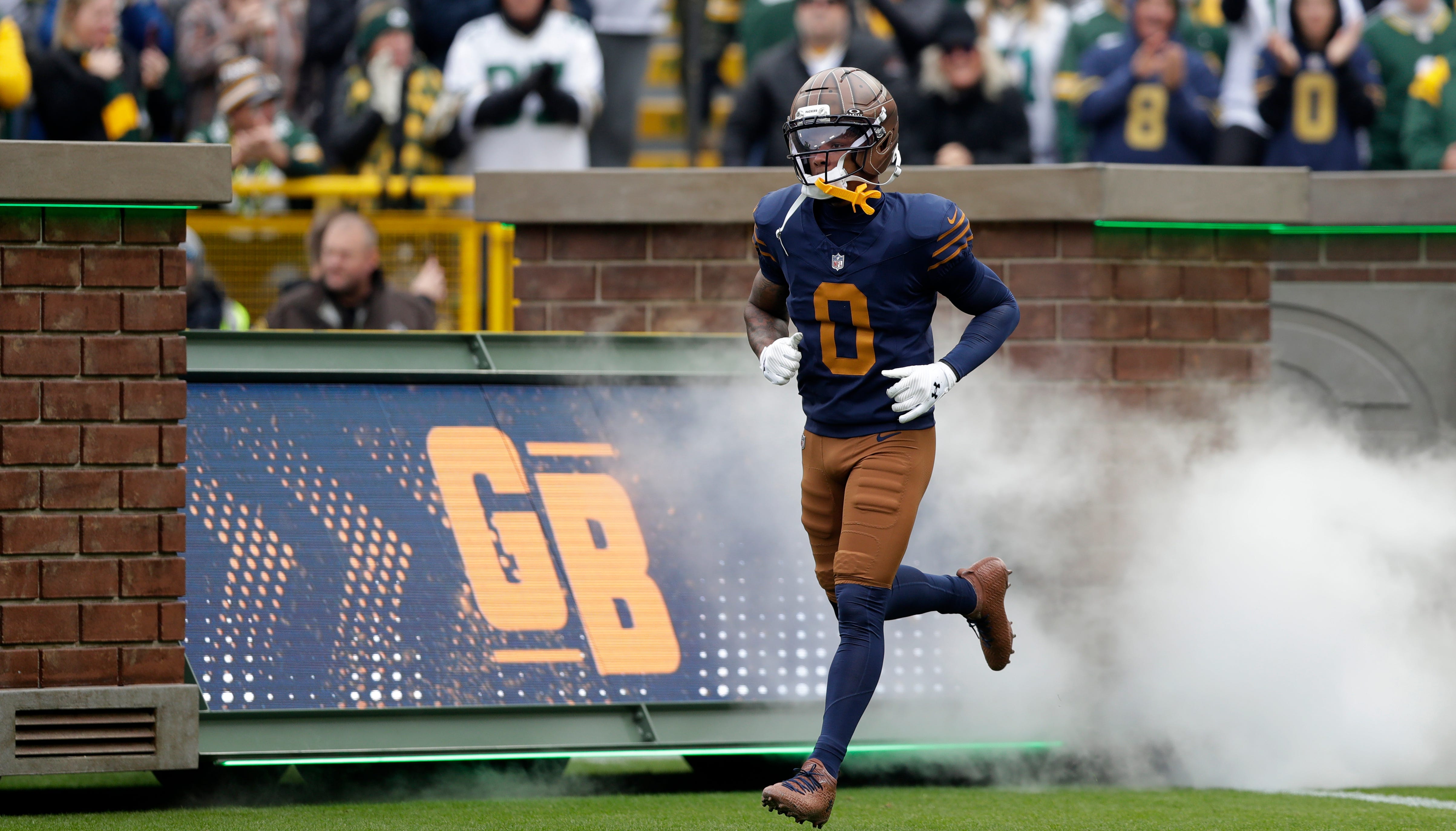 Green Bay Packers wide receiver Matthew Golden (0) runs onto the field before the game against the Carolina Panthers on Nov. 2, 2025, at Lambeau Field in Green Bay, Wis.