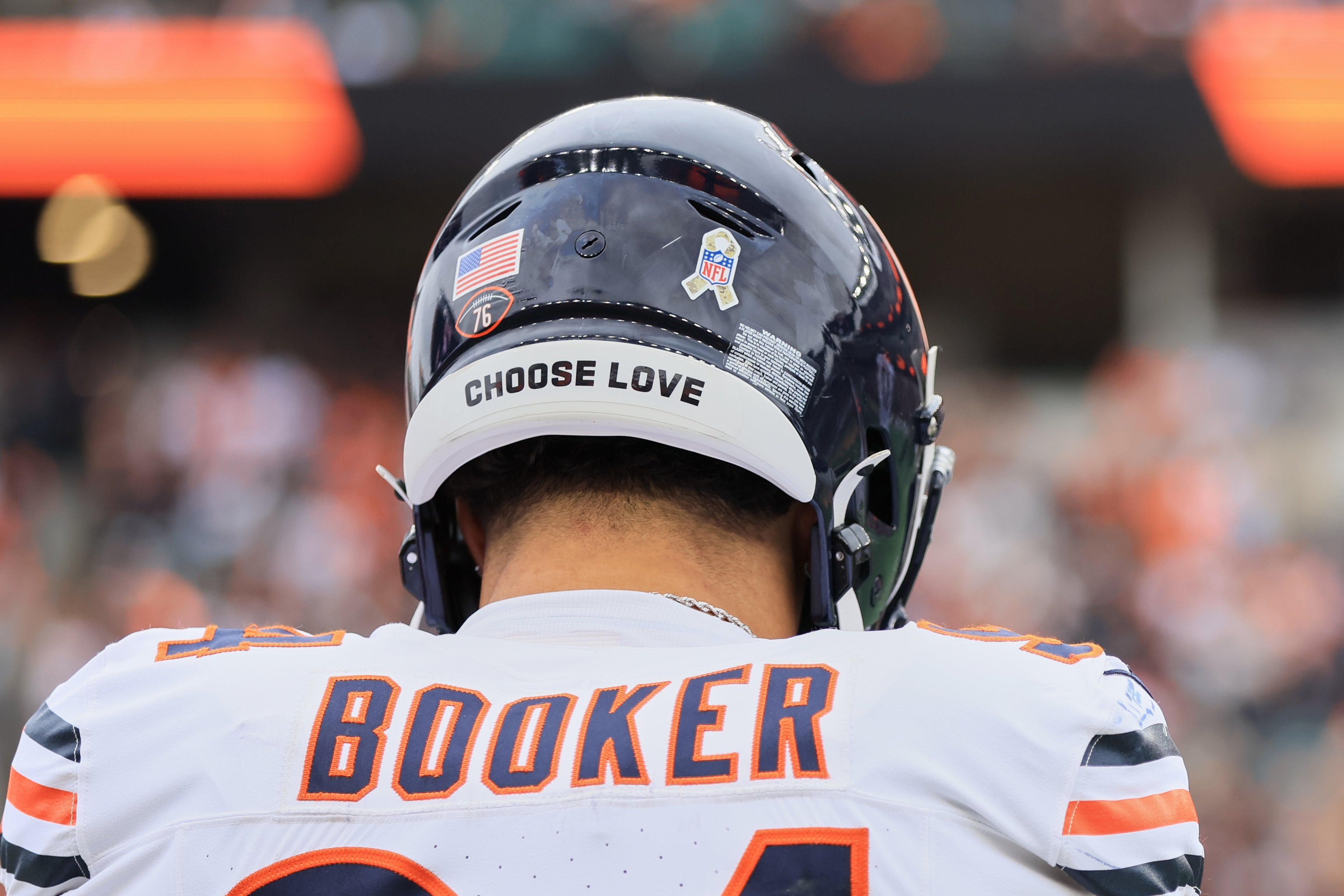 Nov 2, 2025; Cincinnati, Ohio, USA; An NFL emblem celebrating Salute to Service month is seen on the helmet of Chicago Bears defensive end Austin Booker (94) before the game against the Cincinnati Bengals at Paycor Stadium.