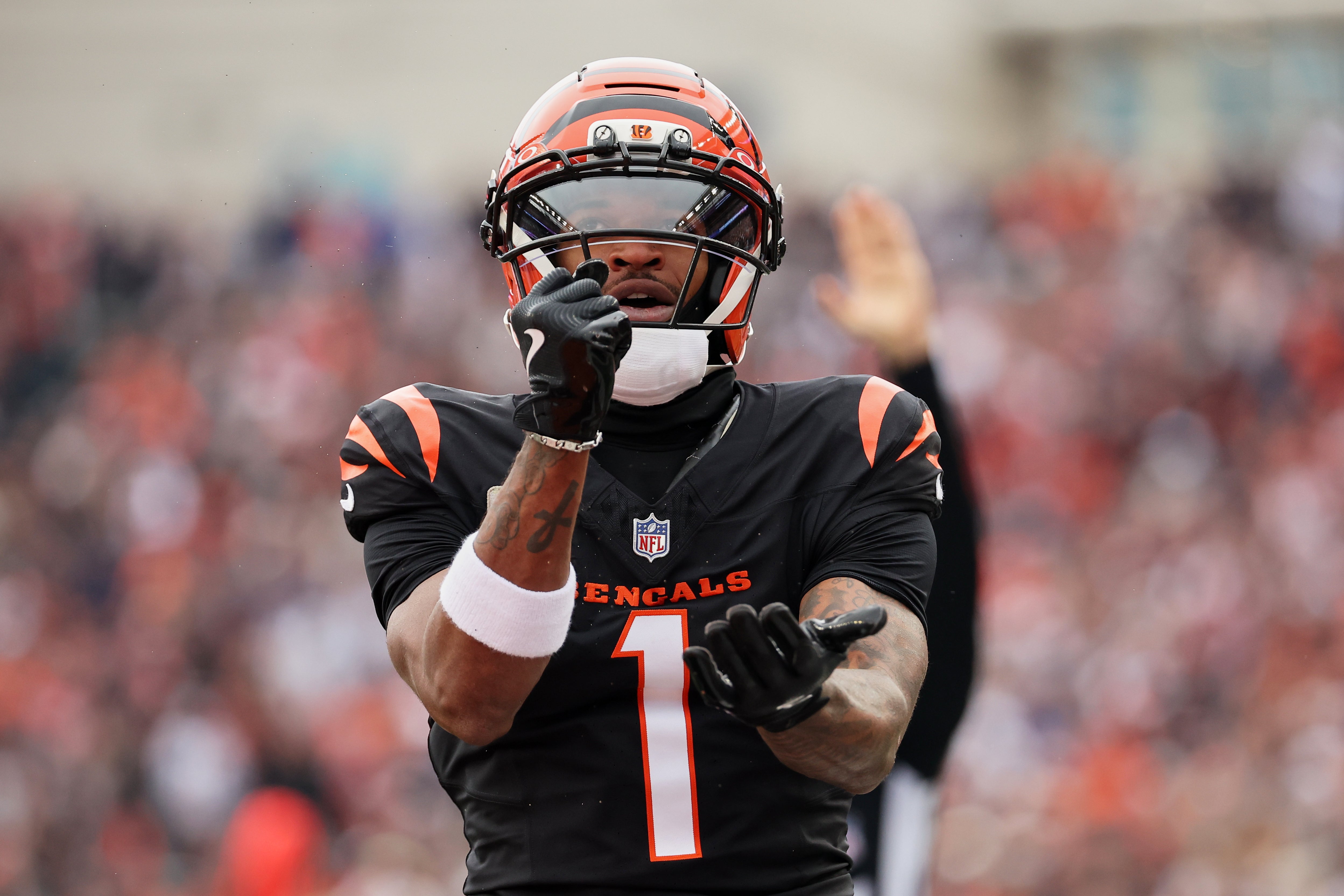 Nov 2, 2025; Cincinnati, Ohio, USA; Cincinnati Bengals wide receiver Ja'Marr Chase (1) celebrates after scoring a touchdown against the Chicago Bears during the second quarter at Paycor Stadium.