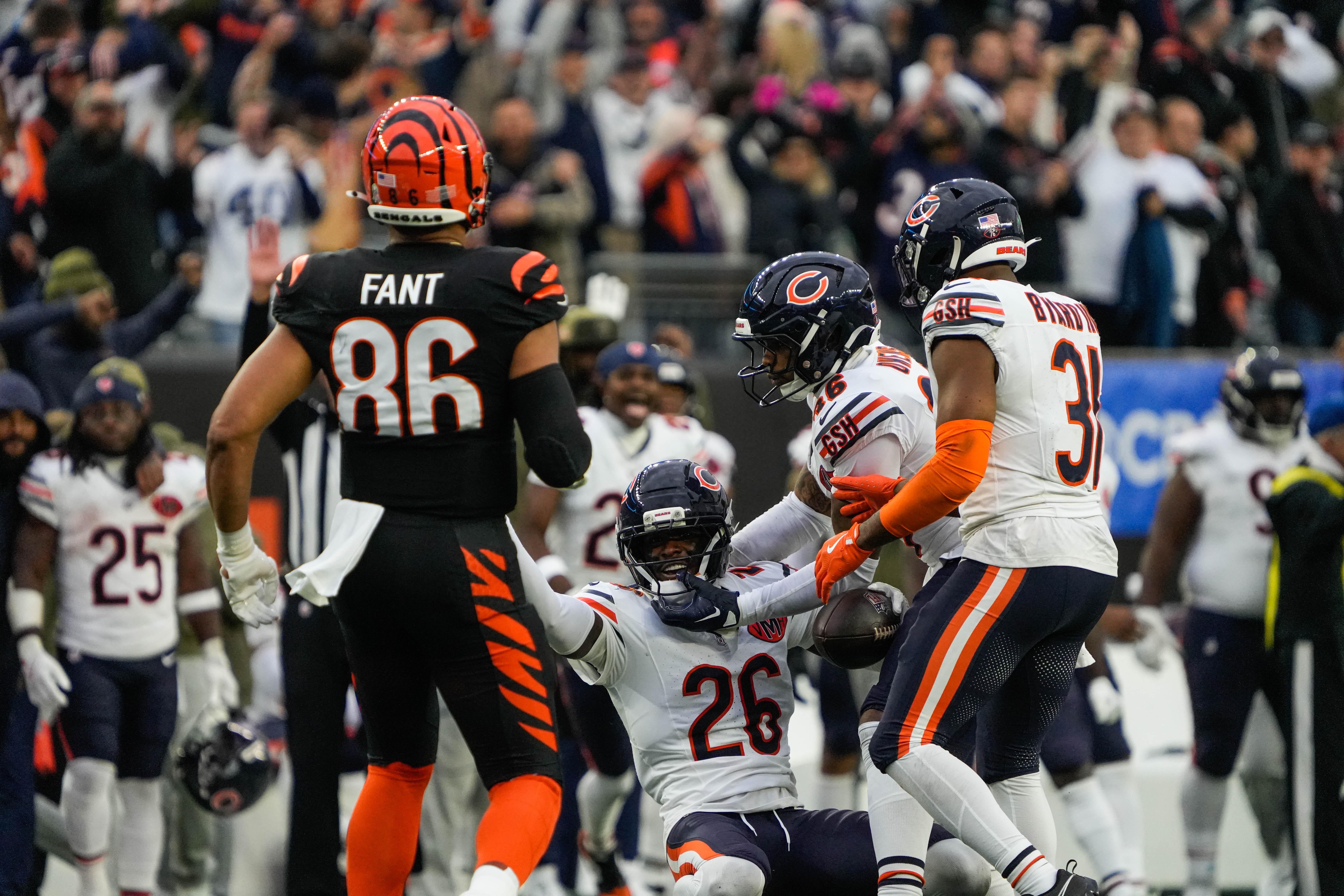 Bears Nahshon Wright (26) is picked up after catching an interception in the last play of the Bengals vs Bears game at Paycor Stadium on Sunday November 2, 2025. The Bears won the game with a final score of 47-42.