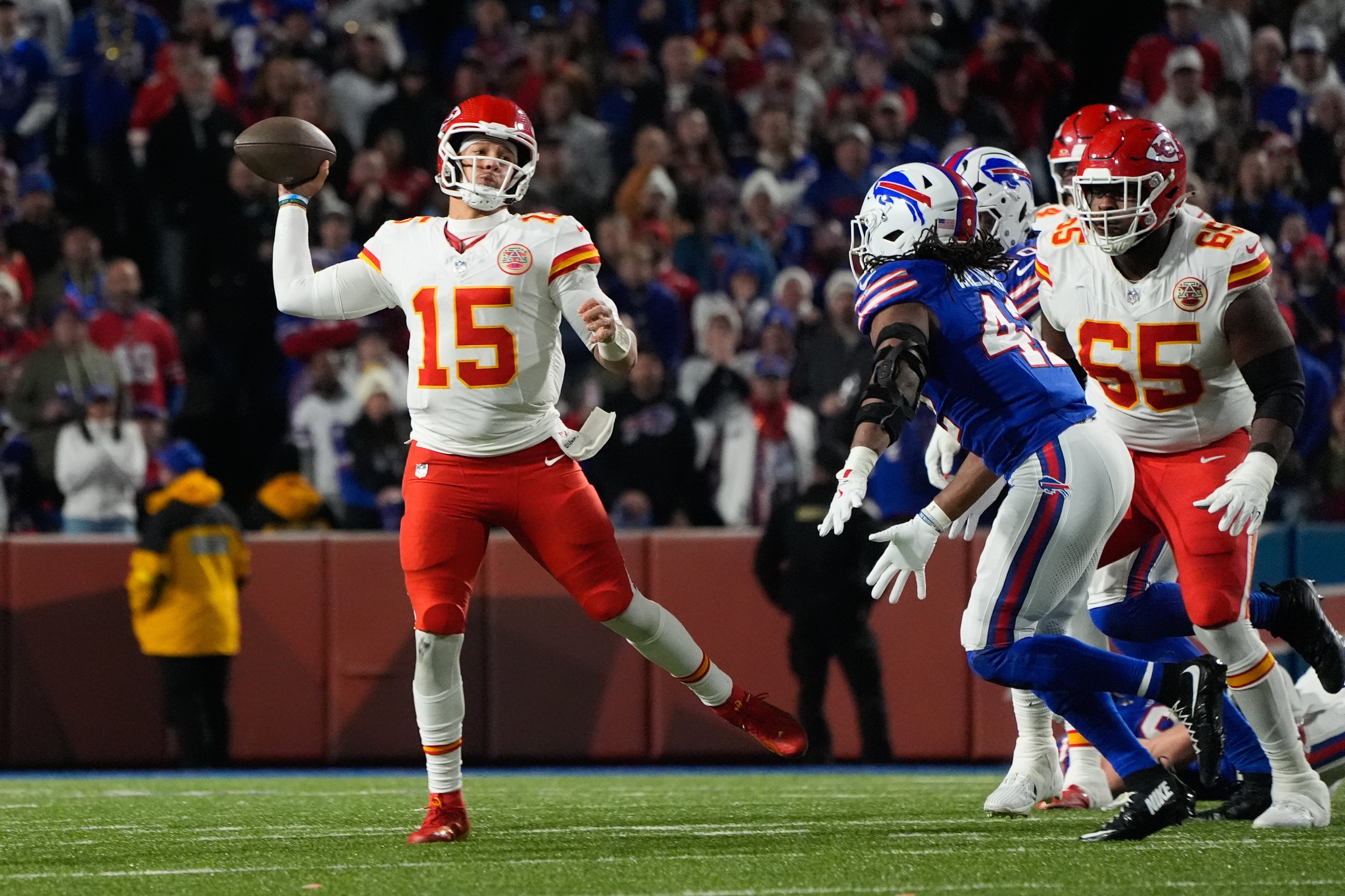 Kansas City Chiefs quarterback Patrick Mahomes (15) throws the ball in the second quarter against the Buffalo Bills at Highmark Stadium.
