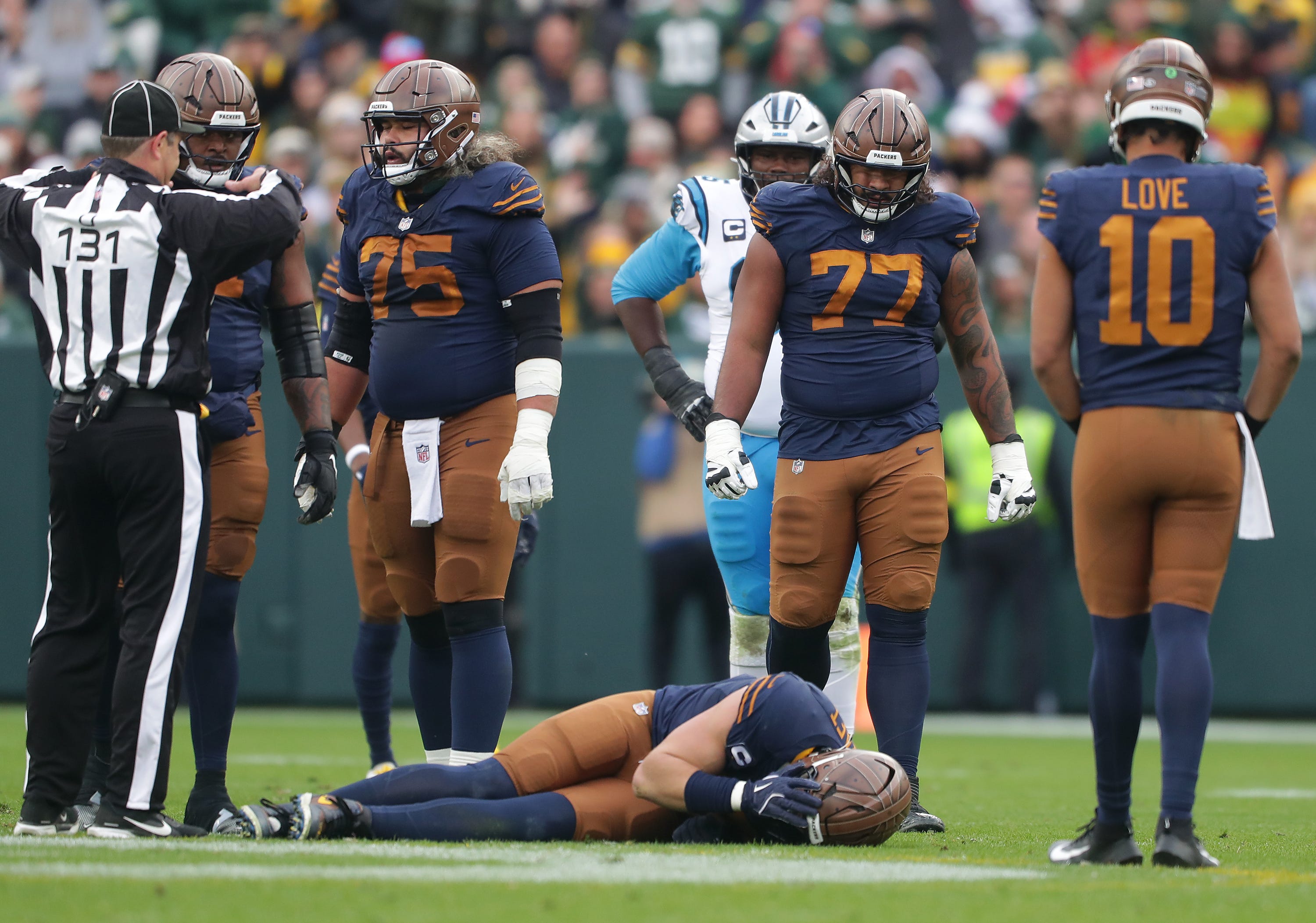 Green Bay Packers tight end Tucker Kraft (85) is injured against the Carolina Panthers on Sunday, November 2, 2025, at Lambeau Field in Green Bay, Wis. Carolina defeated Grewen Bay 16-13.
