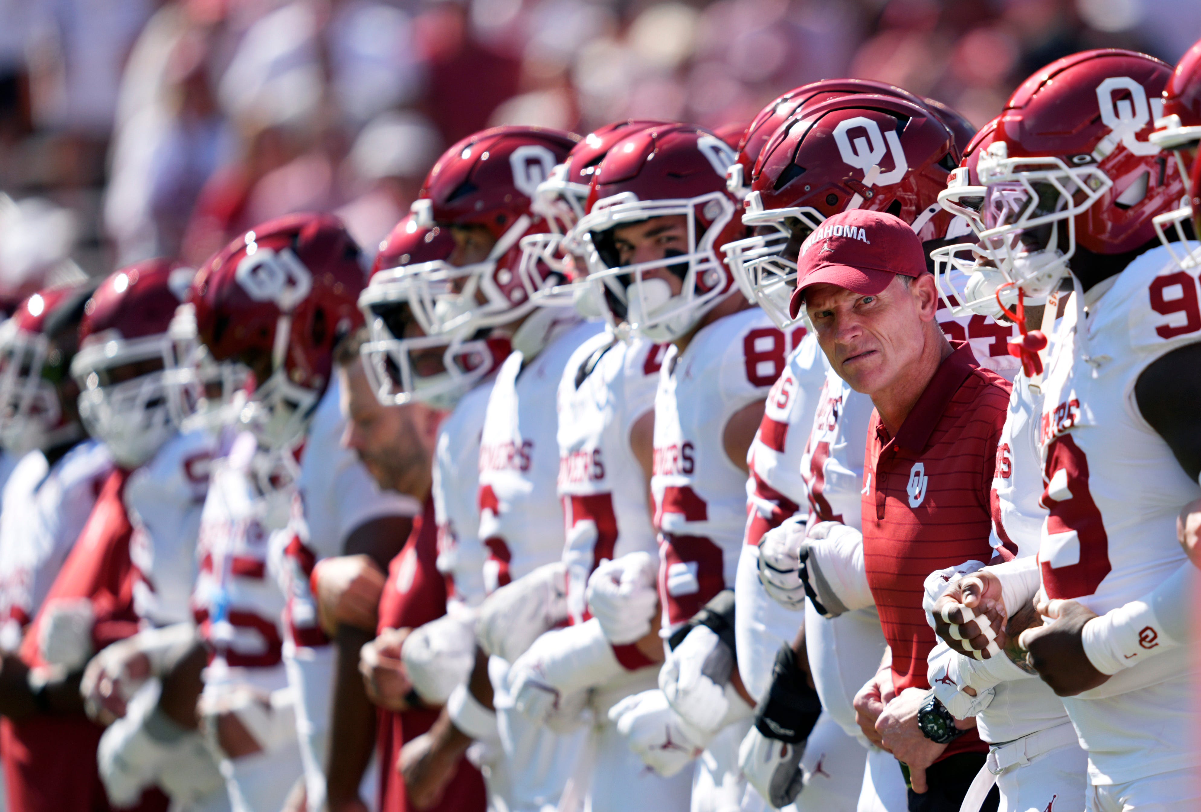 Oklahoma head coach Brent Venables lines up with the team before the Red River Rivalry college football game between the University of Oklahoma Sooners and the Texas Longhorn at the Cotton Bowl Stadium in Dallas, Texas, Saturday, Oct. 11, 2025.