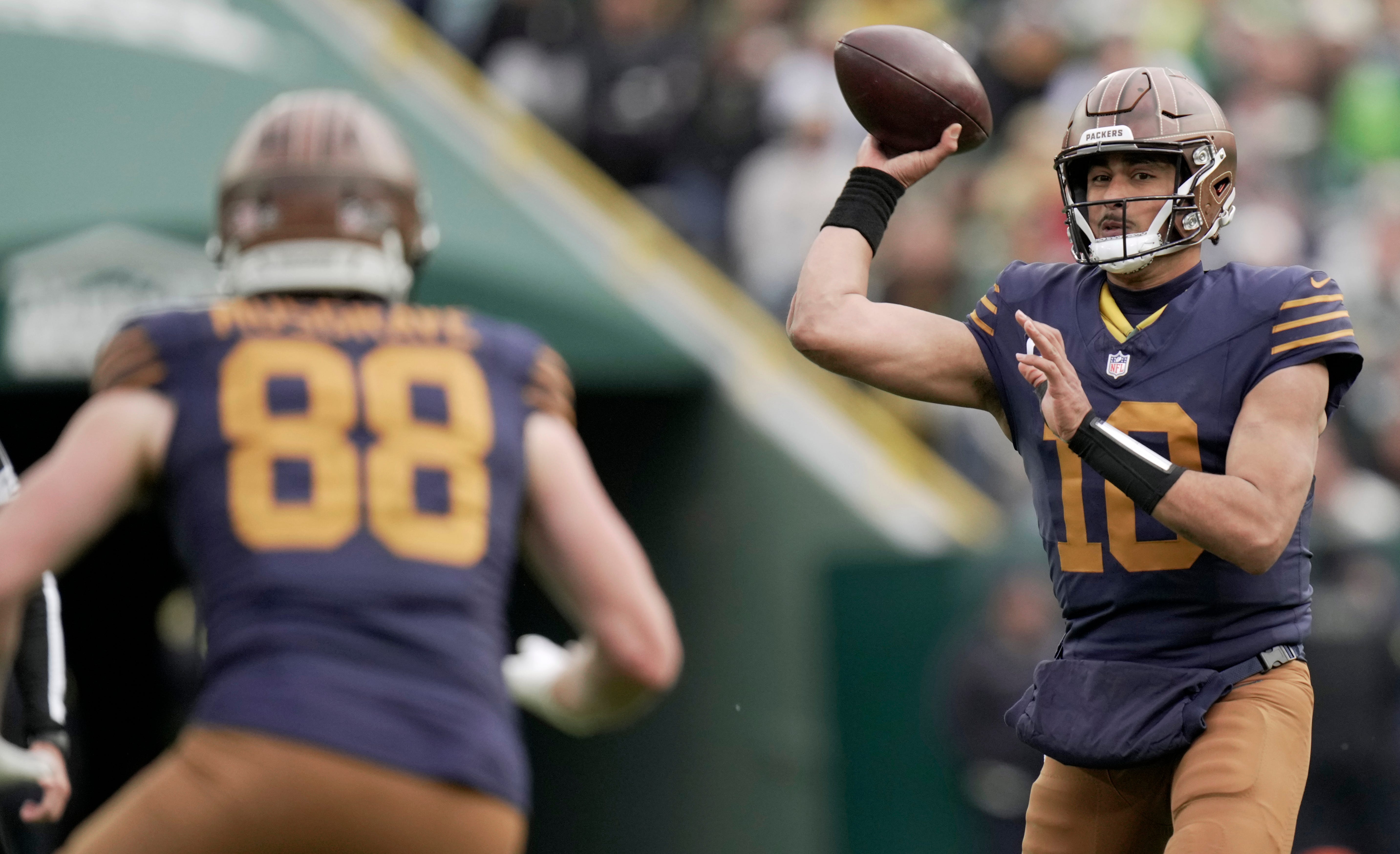 Green Bay Packers quarterback Jordan Love (10) throws a pass to tight end Luke Musgrave (88) during the fourth quarter of their game against the Carolina Panthers Sunday, November 2, 2025 at Lambeau Field in Green Bay, Wisconsin.