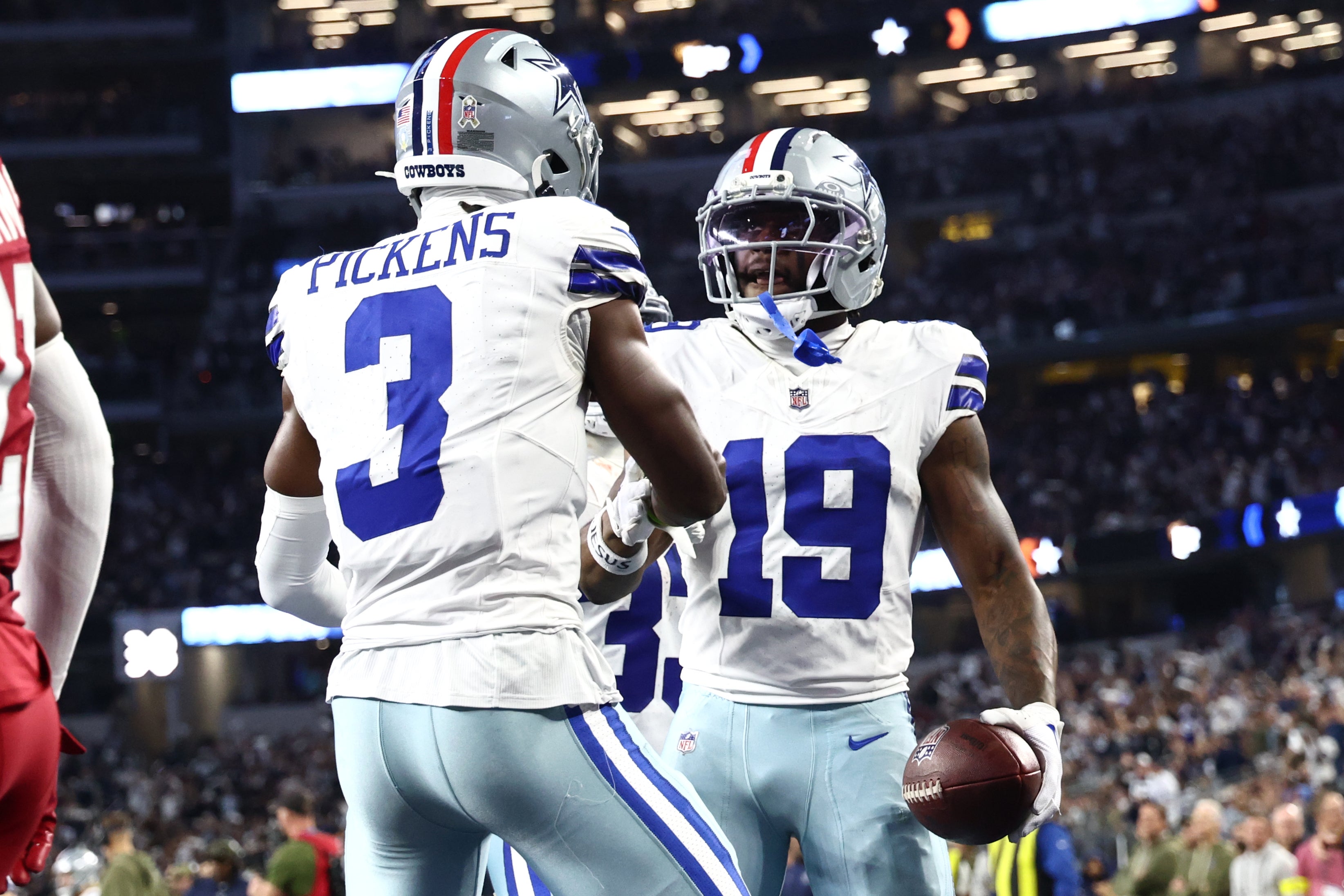 Nov 3, 2025; Arlington, Texas, USA; Dallas Cowboys wide receiver Ryan Flournoy (19) celebrates with wide receiver George Pickens (3) after scoring a touchdown against the Arizona Cardinals in the second half at AT&T Stadium.