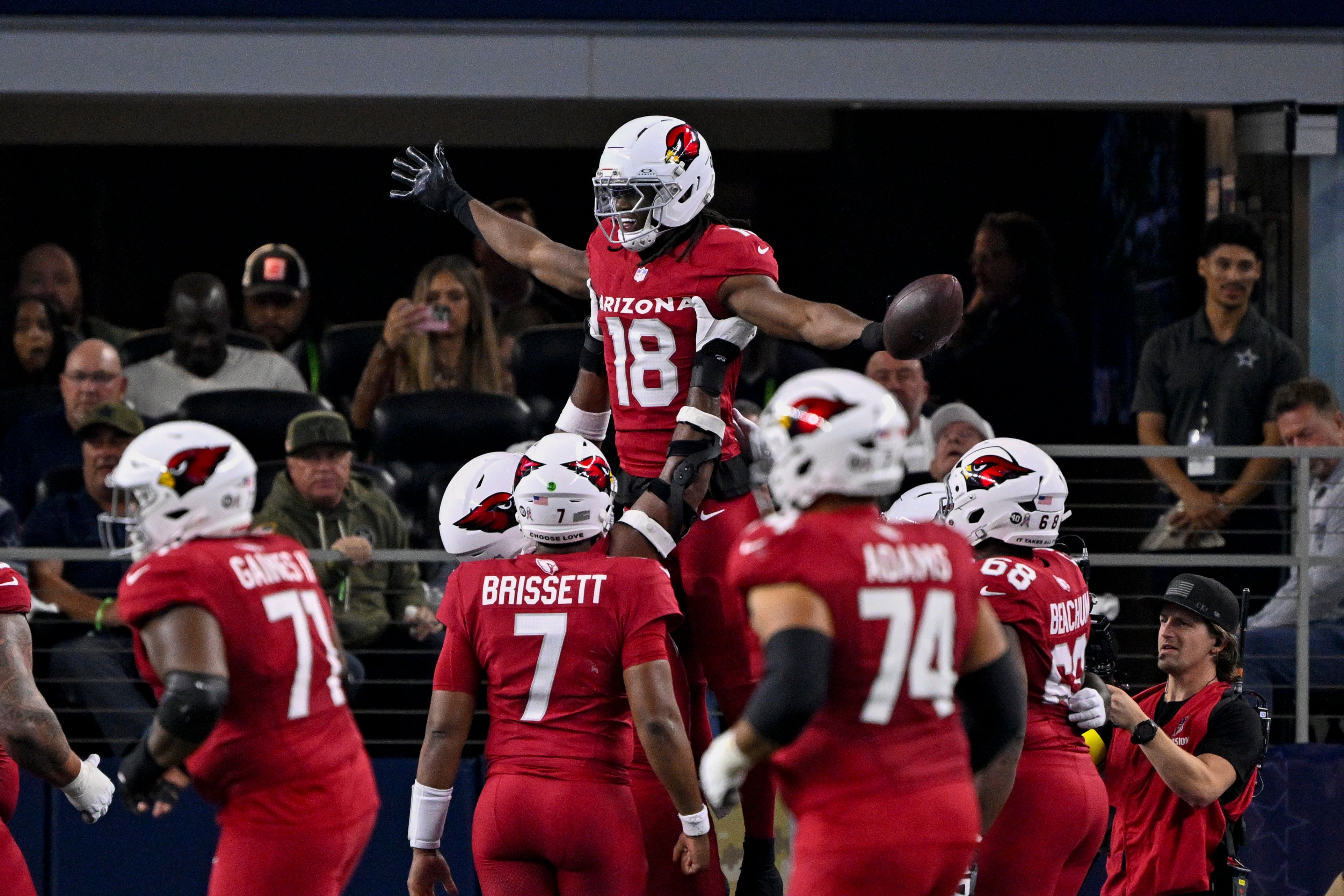 xNov 3, 2025; Arlington, Texas, USA; Arizona Cardinals wide receiver Marvin Harrison Jr. (18) celebrates with his teammates after scoring a touchdown during the game between the Dallas Cowboys and the Arizona Cardinals at AT&T Stadium.