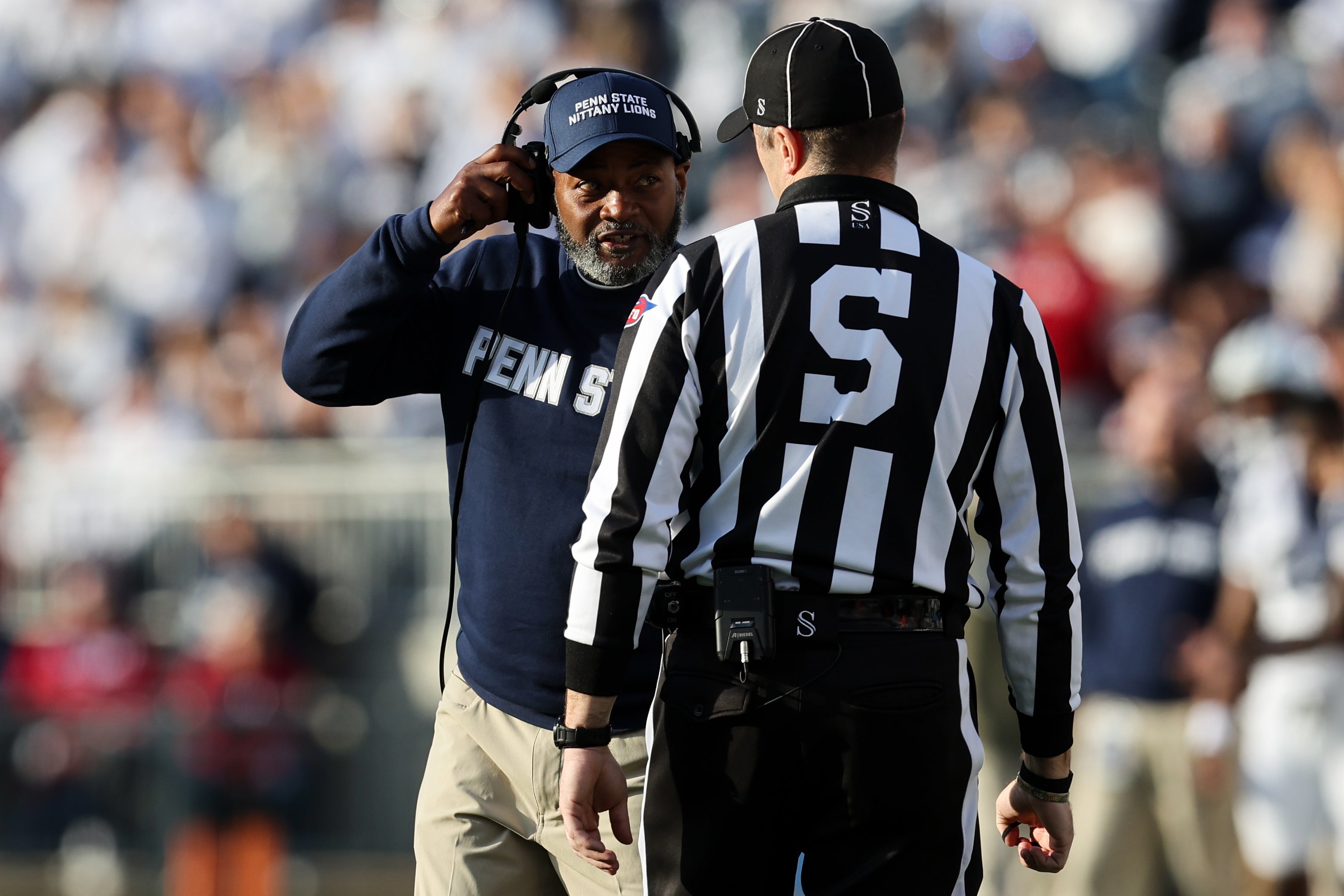 Nov 8, 2025; University Park, Pennsylvania, USA; Penn State Nittany Lions head coach Terry Smith talks with an official during the fourth quarter against the Indiana Hoosiers at Beaver Stadium. Mandatory Credit: Matthew O'Haren-Imagn Images