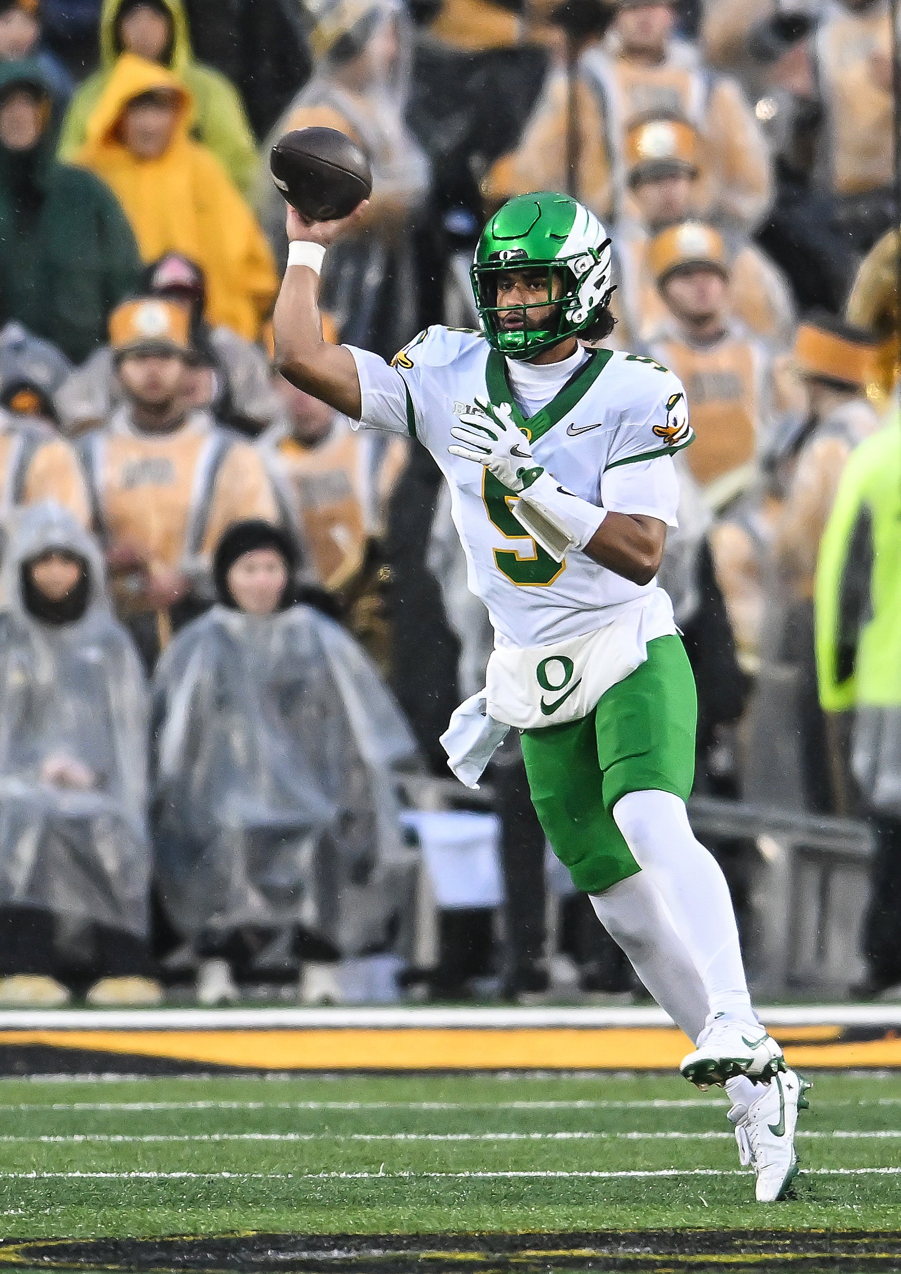 Nov 8, 2025; Iowa City, Iowa, USA; Oregon Ducks quarterback Dante Moore (5) throws a pass during the second quarter at Kinnick Stadium. Mandatory Credit: Jeffrey Becker-Imagn Images