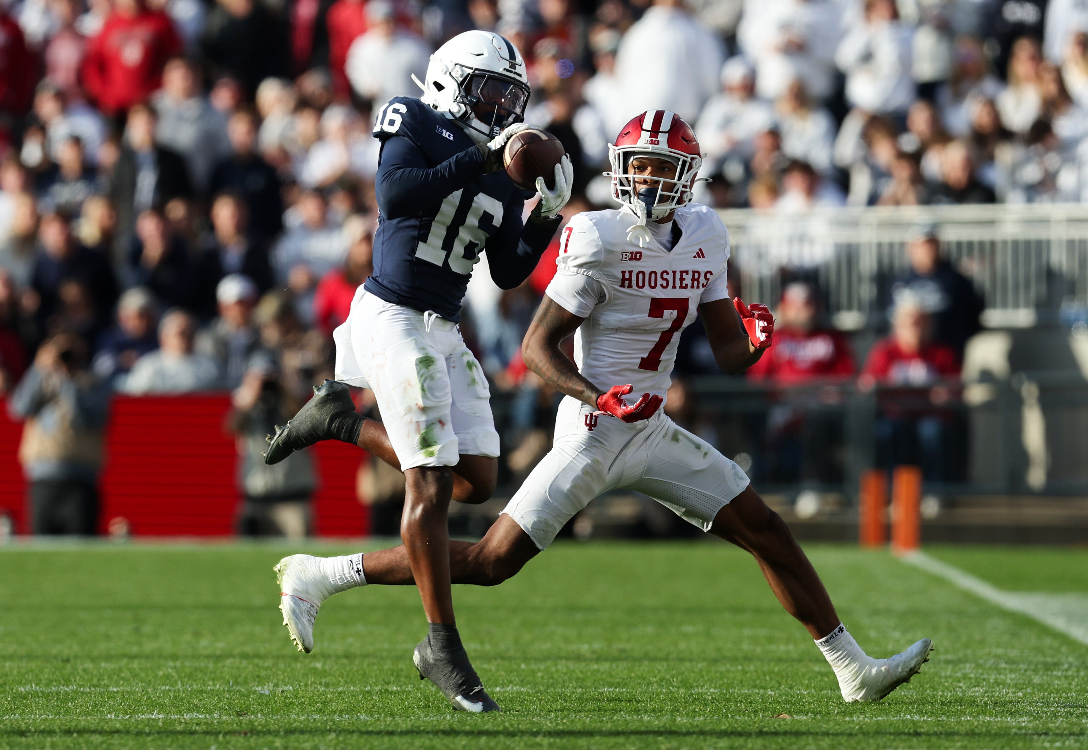 Nov 8, 2025; University Park, Pennsylvania, USA; Penn State Nittany Lions safety King Mack (16) intercepts the ball during the fourth quarter against the Indiana Hoosiers at Beaver Stadium. Mandatory Credit: Matthew O'Haren-Imagn Images