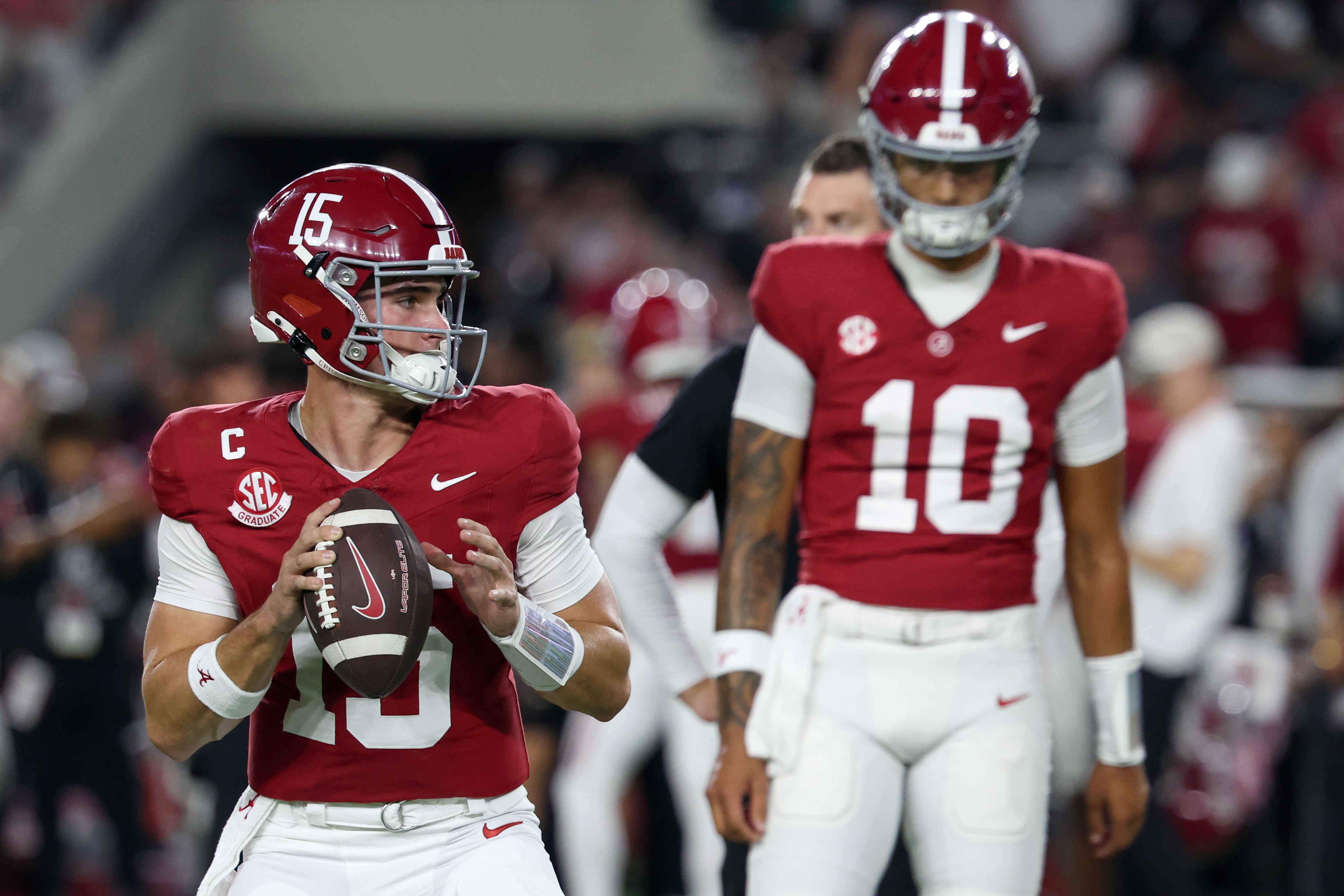 Nov 8, 2025; Tuscaloosa, Alabama, USA; Alabama Crimson Tide quarterback Ty Simpson (15) warms up prior to the game against the Louisiana State Tigers at Saban Field at Bryant-Denny Stadium.