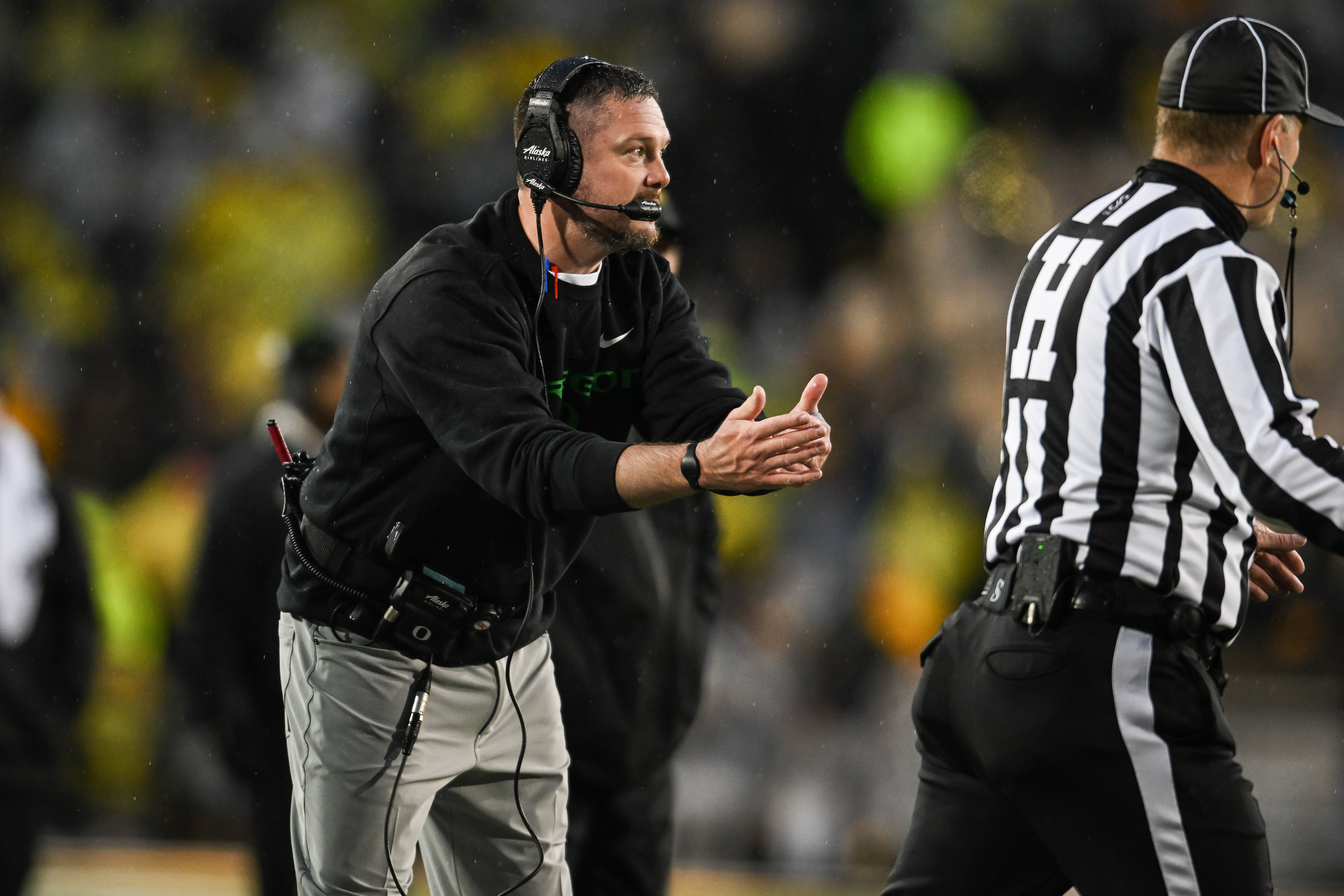 Nov 8, 2025; Iowa City, Iowa, USA; Oregon Ducks head coach Dan Lanning calls a timeout during the third quarter against the Iowa Hawkeyes at Kinnick Stadium. Mandatory Credit: Jeffrey Becker-Imagn Images