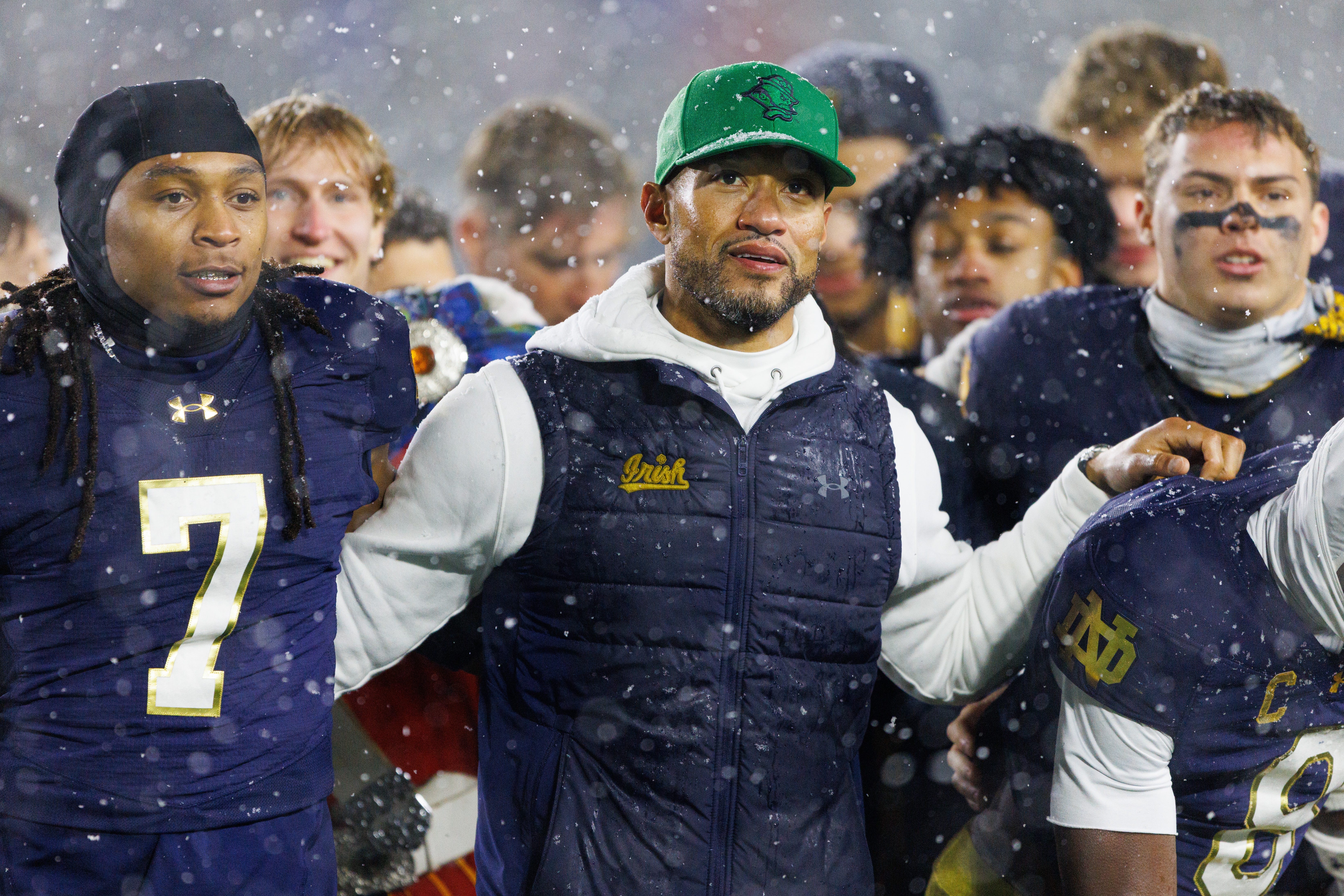 Notre Dame head coach Marcus Freeman celebrates with his players after winning a NCAA football game 49-10 against Navy at Notre Dame Stadium on Saturday, Nov. 8, 2025, in South Bend.