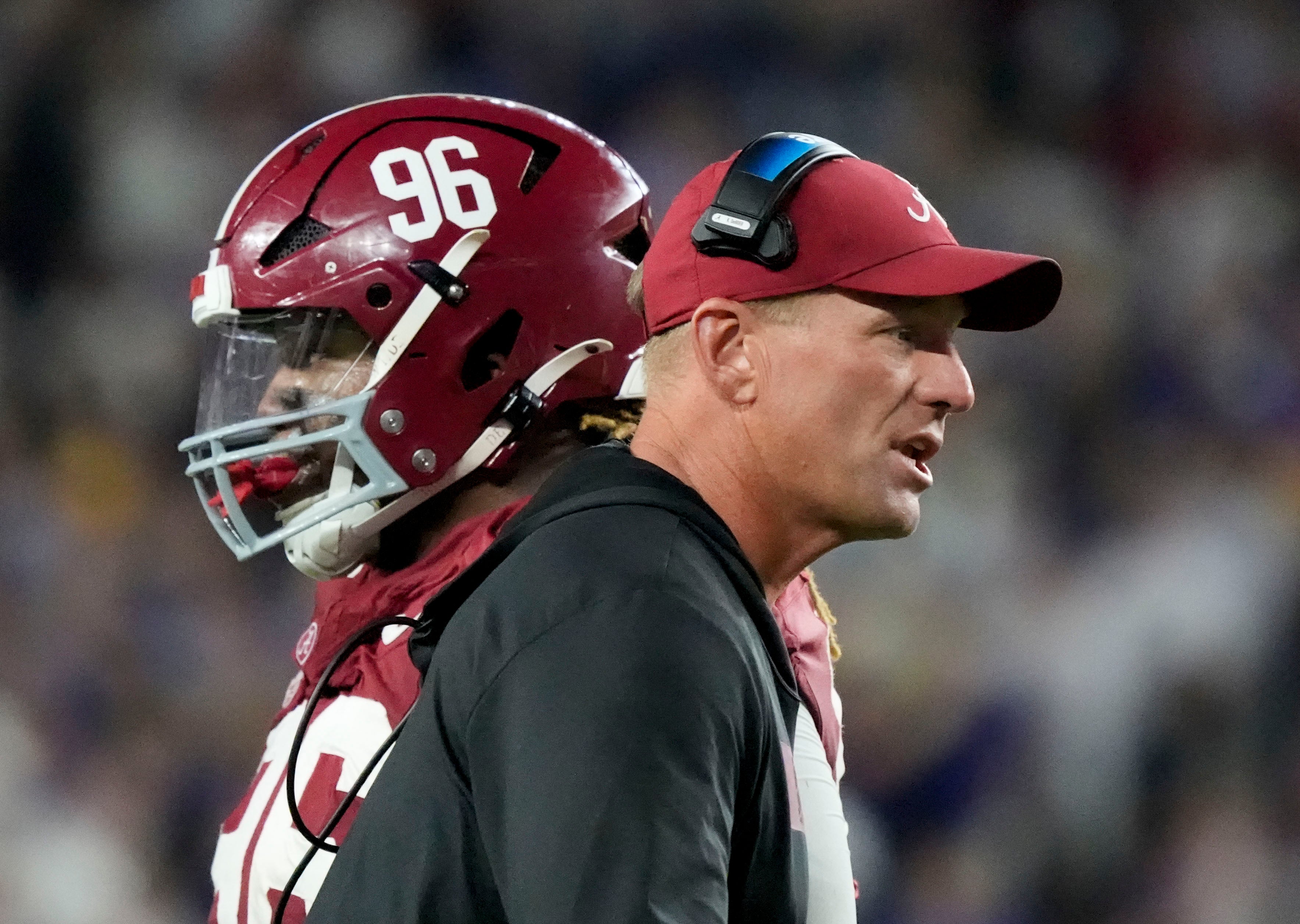 Nov 8, 2025; Tuscaloosa, Alabama, USA; Alabama head coach Kalen DeBoer goes out to congratulate players coming off the field as Alabama defensive lineman Tim Keenan III (96) comes to the sideline at Saban Field at Bryant-Denny Stadium. Alabama defeated LSU 20-9.