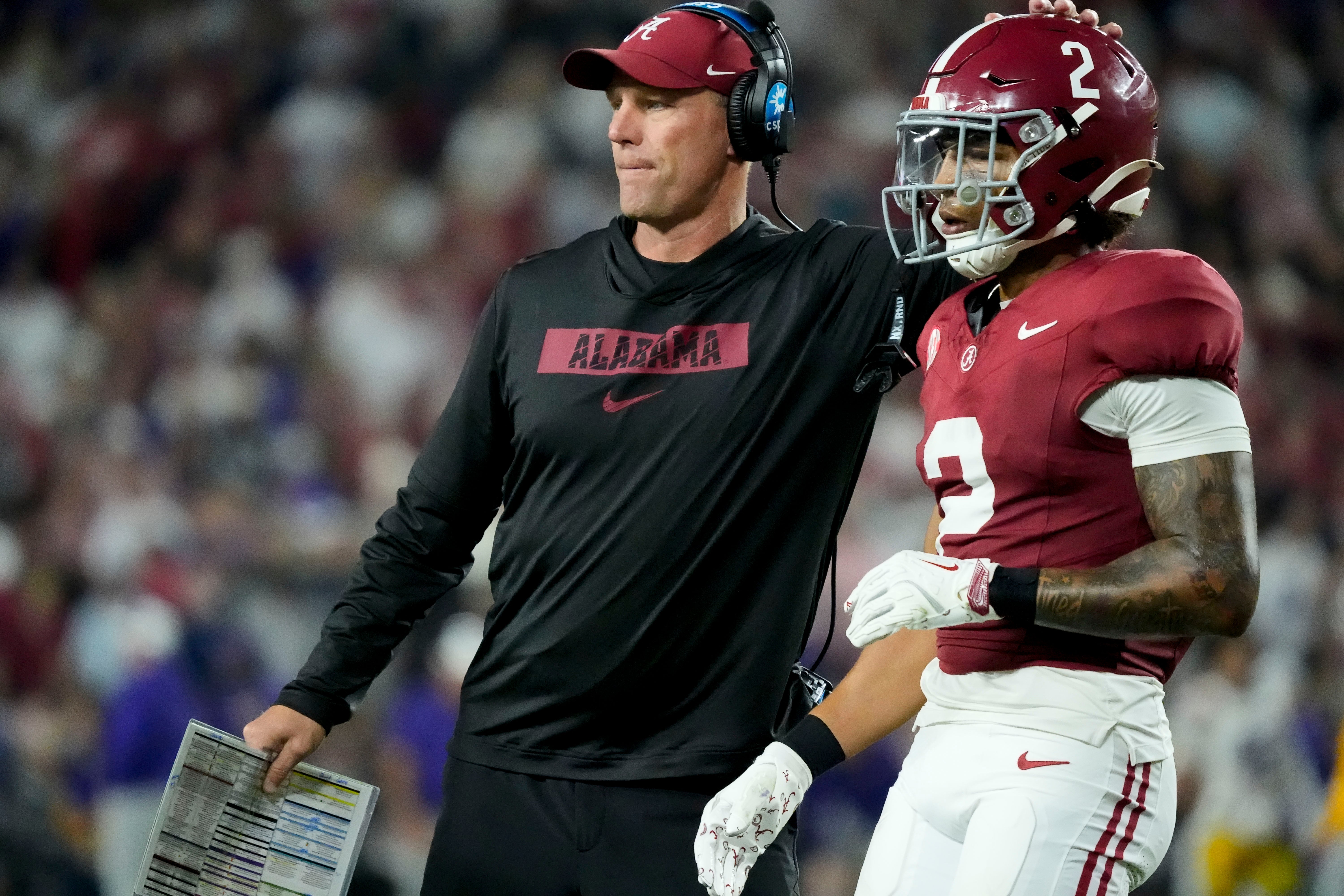 Nov 8, 2025; Tuscaloosa, Alabama, USA; Alabama head coach Kalen DeBoer congratulates Alabama defensive back Zabien Brown (2) as he leaves the field after a stop against LSU at Saban Field at Bryant-Denny Stadium. Alabama defeated LSU 20-9.