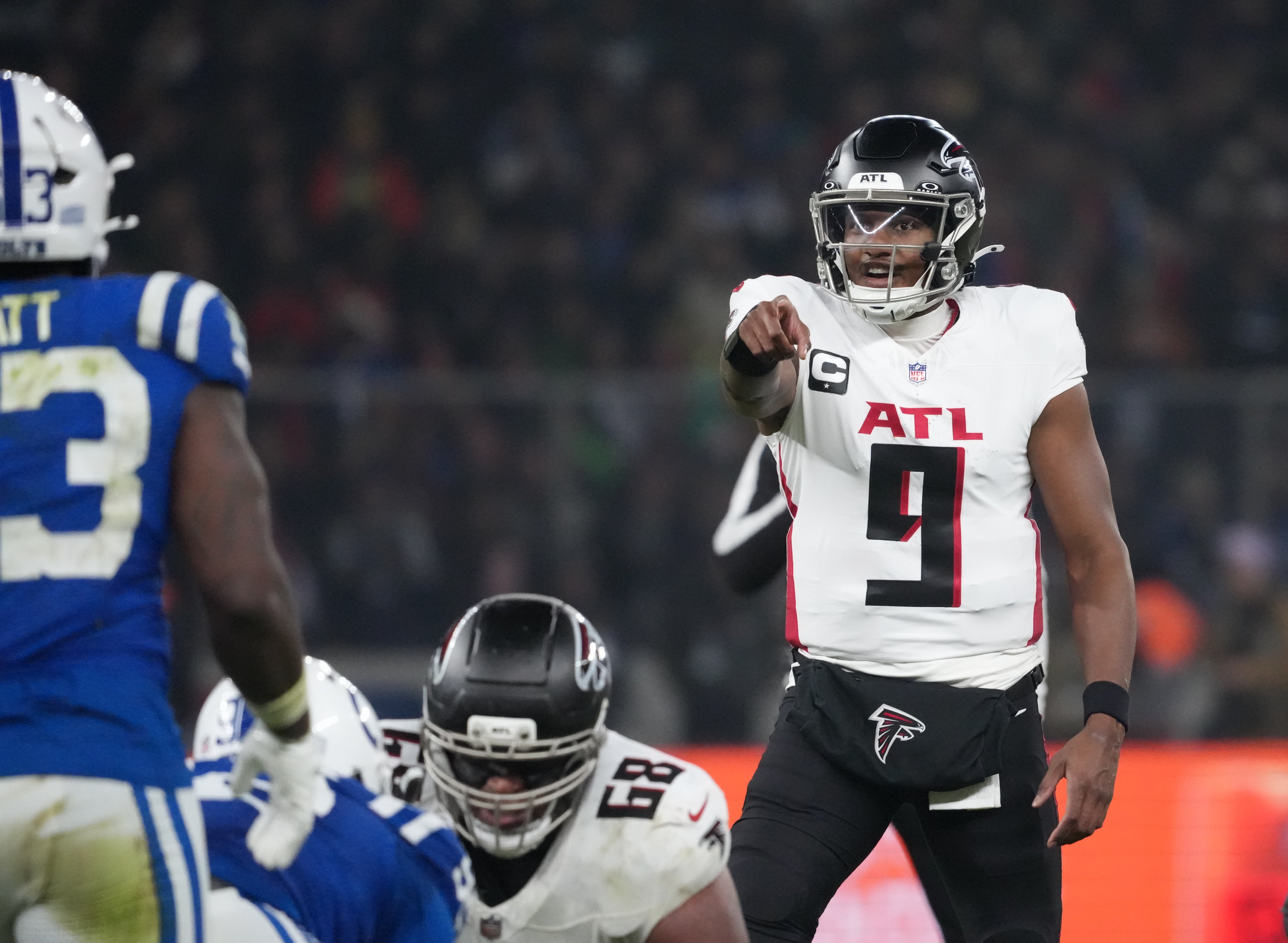 Nov 9, 2025; Berlin, Germany; Atlanta Falcons quarterback Michael Penix Jr. (9) gestures before the snap against the Indianapolis Colts during the NFL Berlin Game at Olympic Stadium.