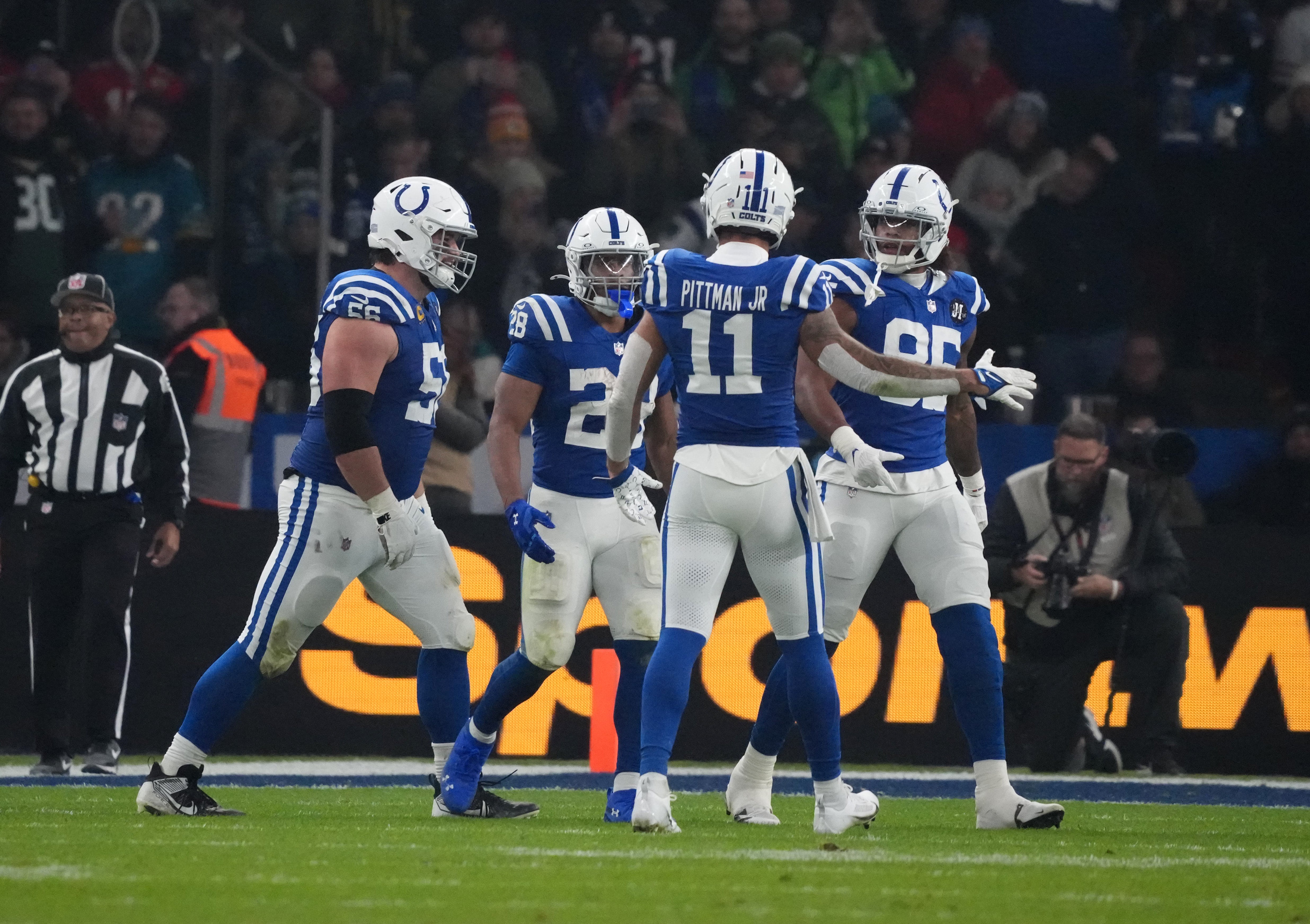 Colts players celebrate a play in Germany