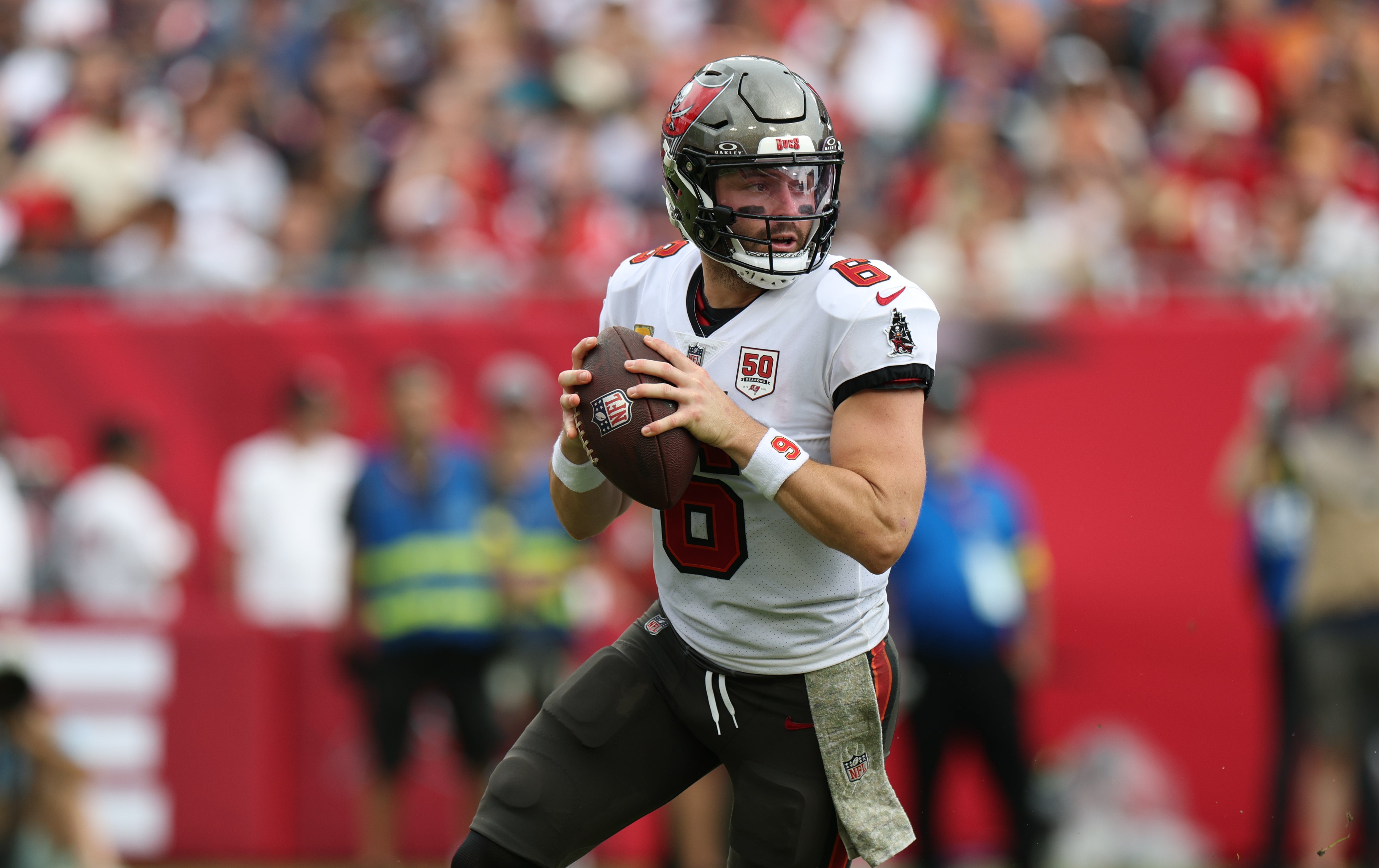 Nov 9, 2025; Tampa, Florida, USA; Tampa Bay Buccaneers quarterback Baker Mayfield (6) runs in the pocket during the second quarter against the New England Patriots at Raymond James Stadium.