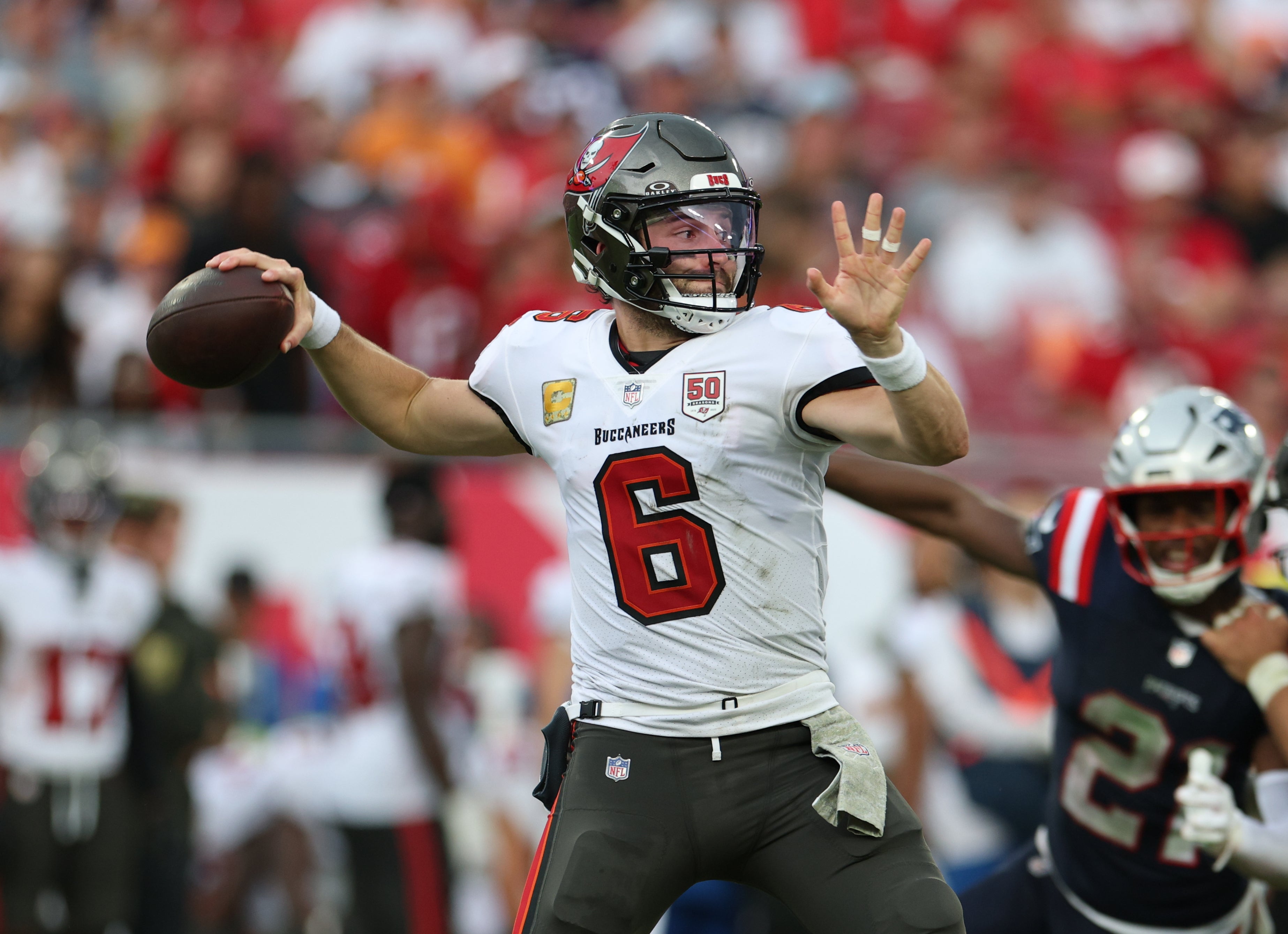Nov 9, 2025; Tampa, Florida, USA; Tampa Bay Buccaneers quarterback Baker Mayfield (6) throws downfield during the third quarter against the New England Patriots at Raymond James Stadium.