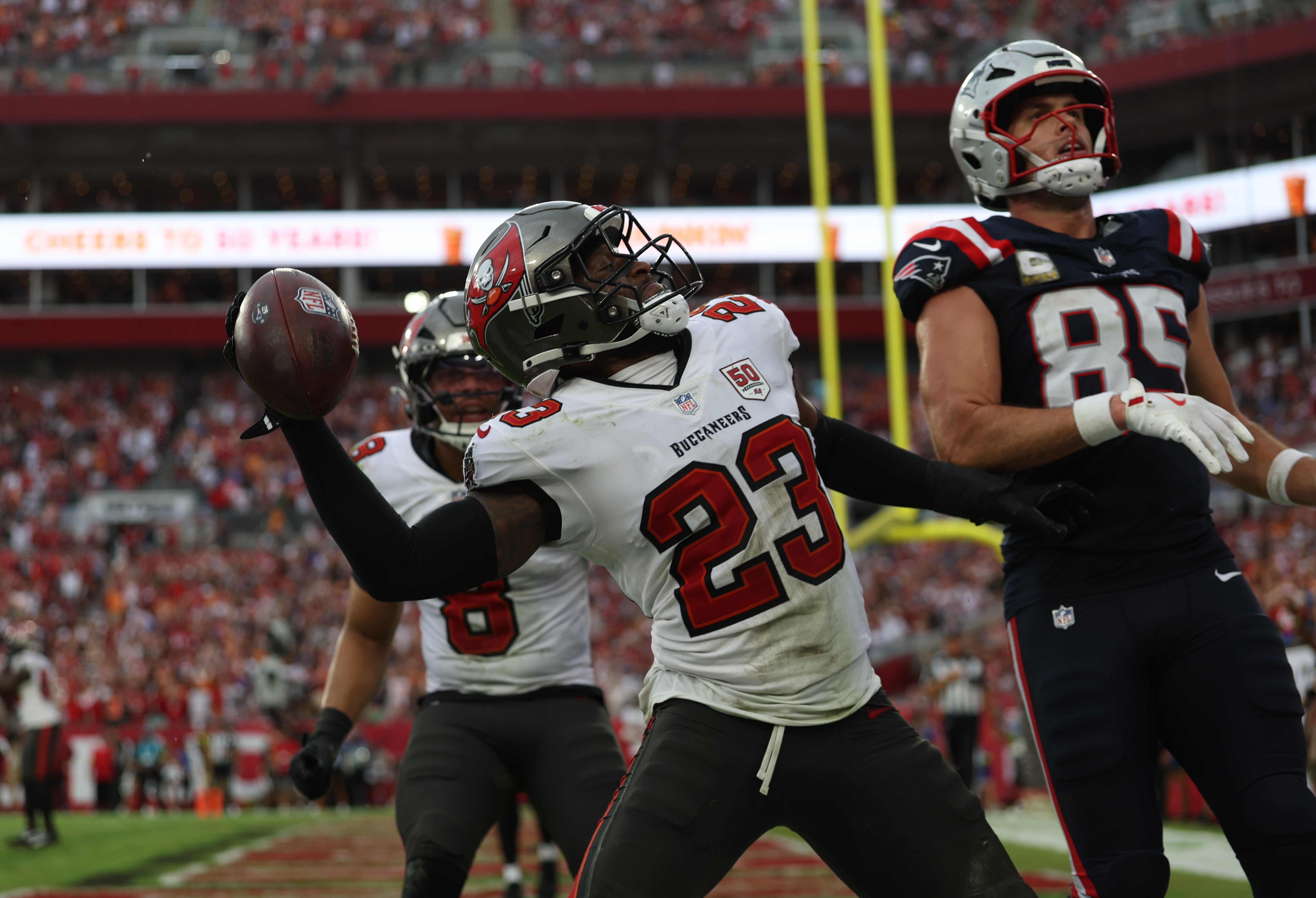 Nov 9, 2025; Tampa, Florida, USA; Tampa Bay Buccaneers safety Tykee Smith (23) reacts after an interception during the fourth quarter against the New England Patriots at Raymond James Stadium.