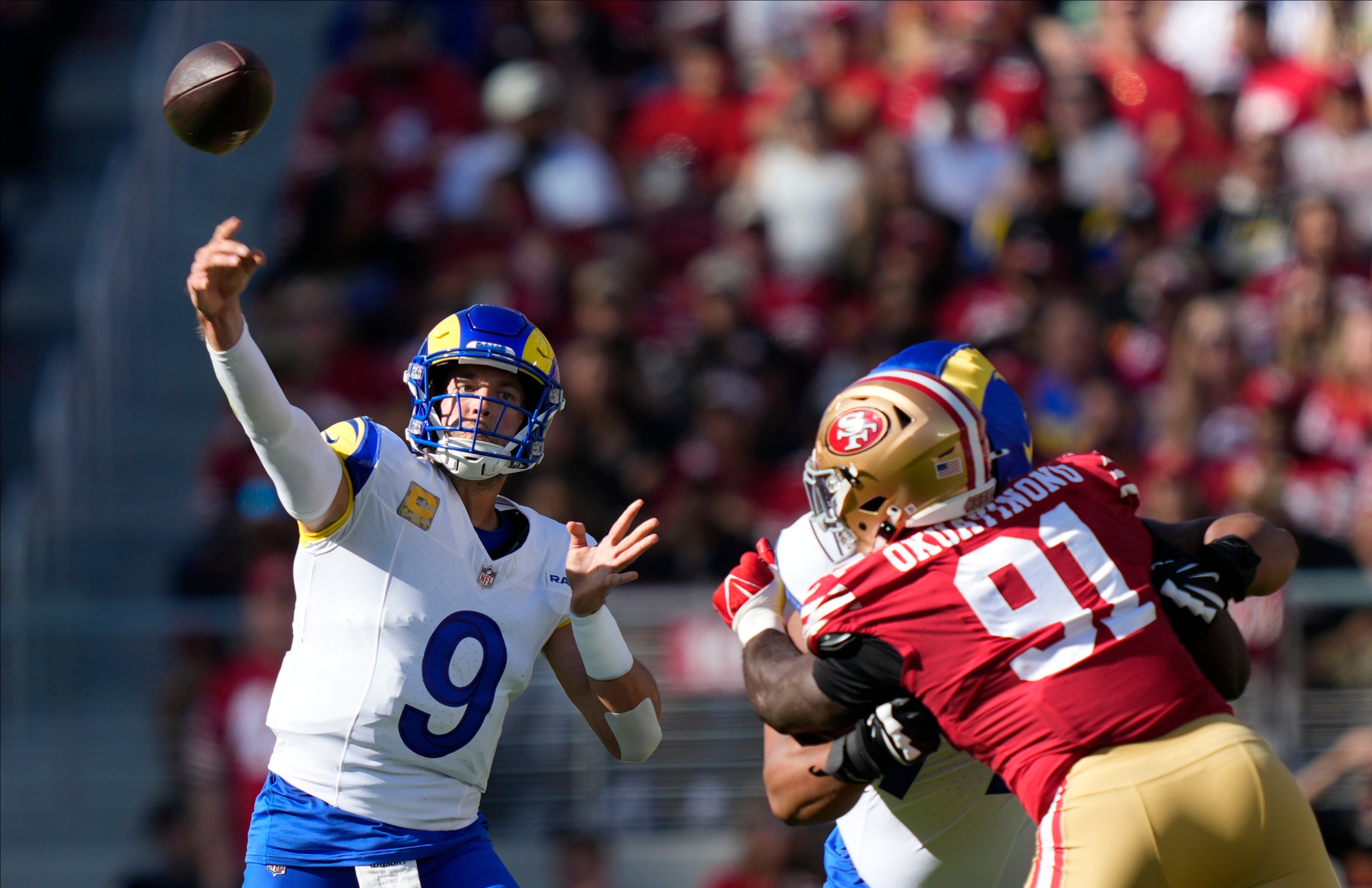 Los Angeles Rams quarterback Matthew Stafford (9) throws a pass during the first quarter against the San Francisco 49ers