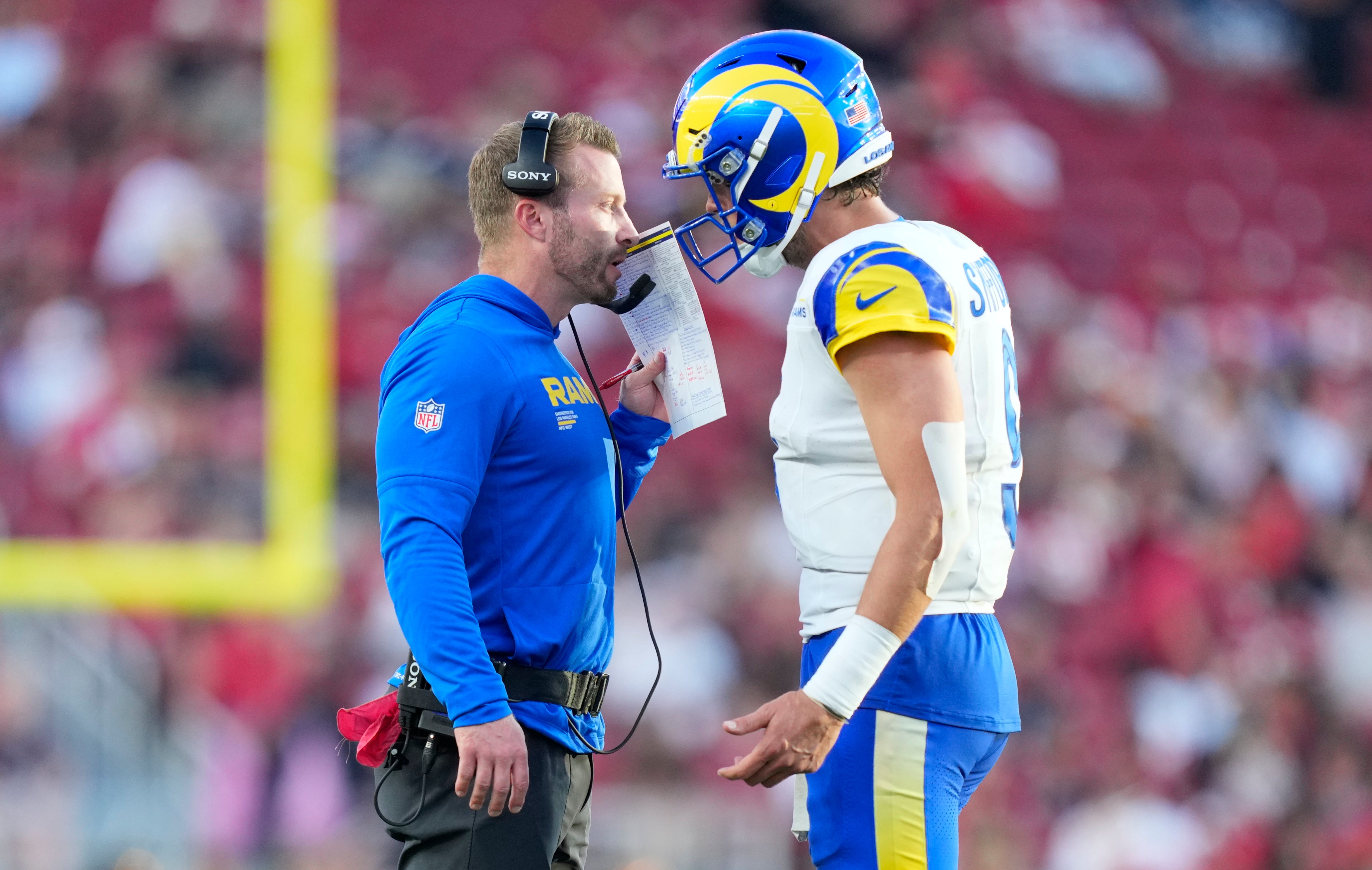 Nov 9, 2025; Santa Clara, California, USA; Los Angeles Rams head coach Sean McVay talks with Los Angeles Rams quarterback Matthew Stafford (9) during the fourth quarter against the San Francisco 49ers at Levi's Stadium.