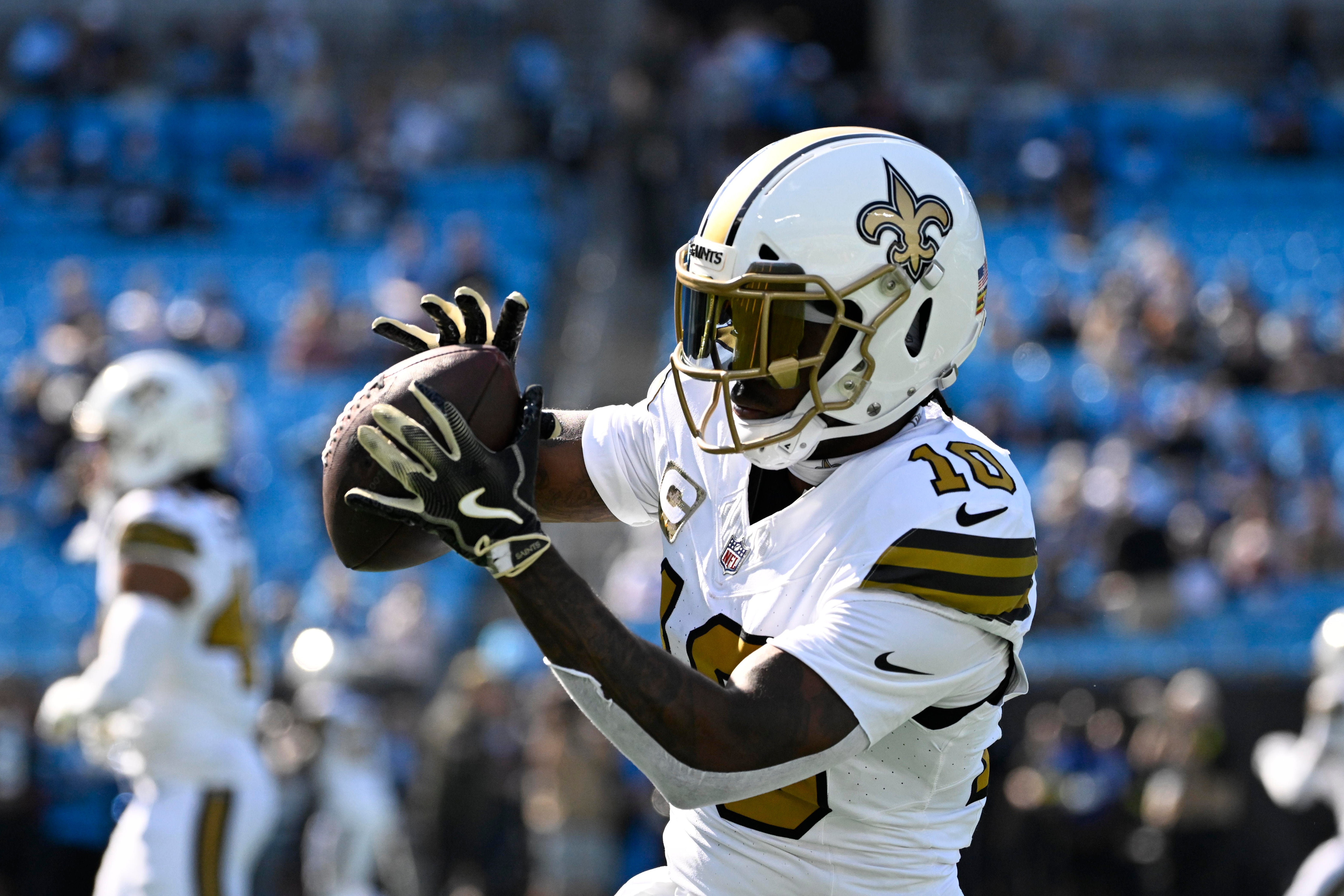 Nov 9, 2025; Charlotte, North Carolina, USA; New Orleans Saints wide receiver Brandin Cooks (10) warms up before the game at Bank of America Stadium.