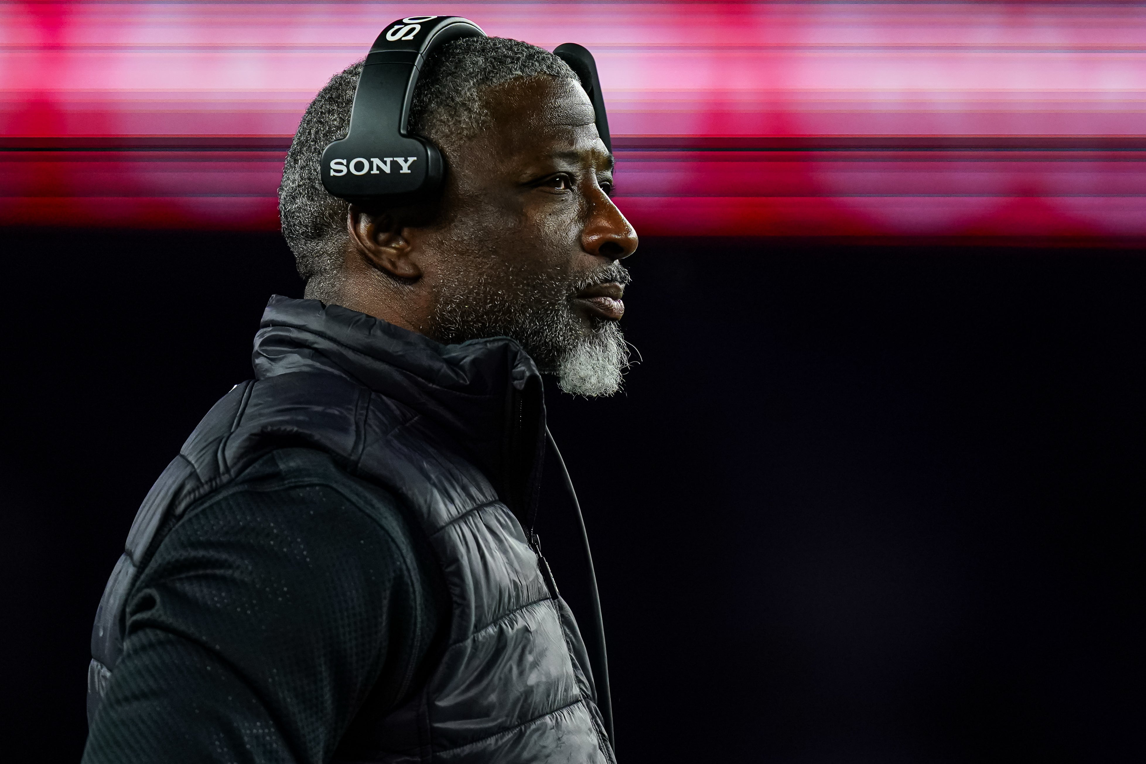 Nov 13, 2025; Foxborough, Massachusetts, USA; New York Jets head coach Aaron Glenn watches from the sideline as they take on the New England Patriots at Gillette Stadium.