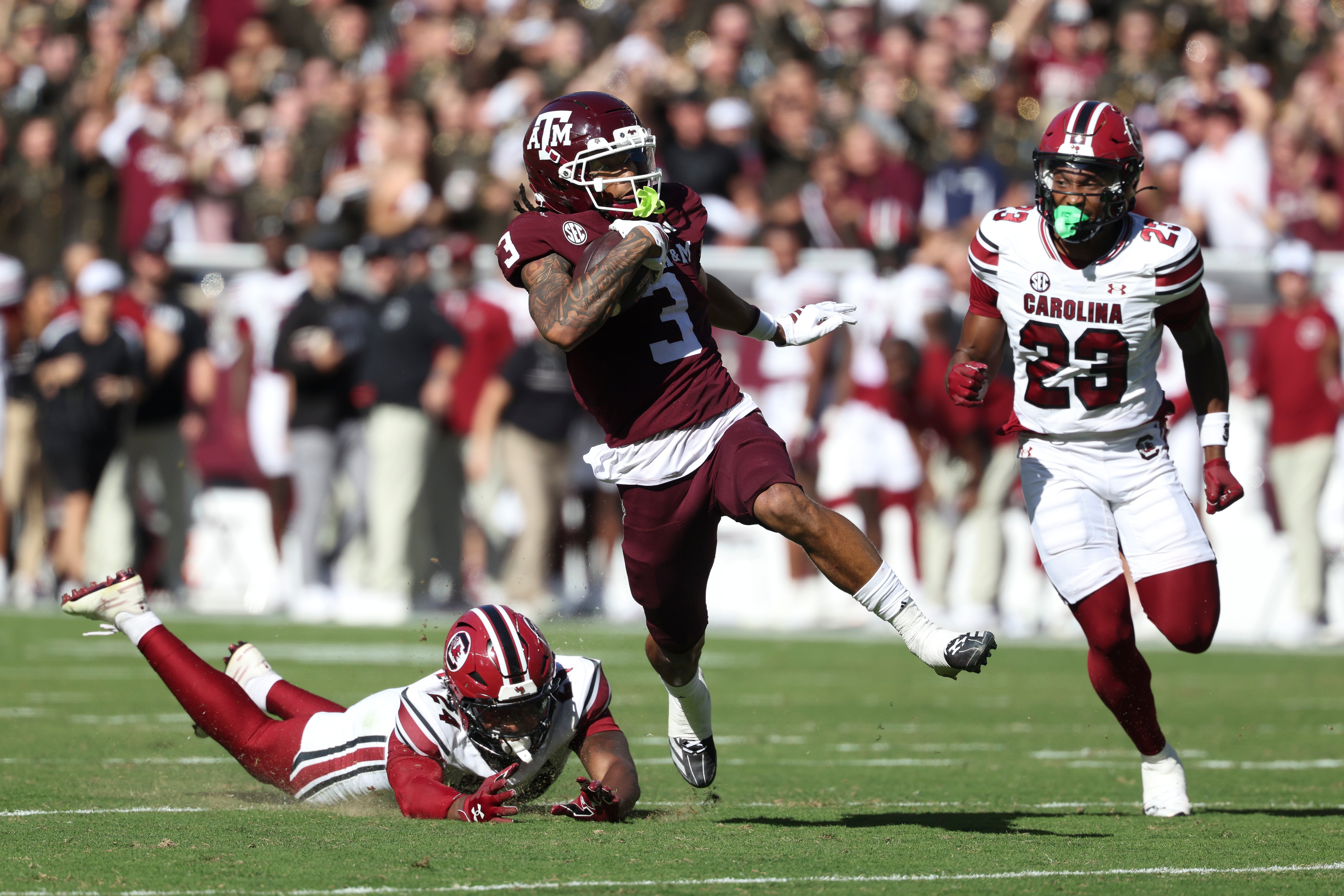 Nov 15, 2025; College Station, Texas, USA; Texas A&M Aggies wide receiver Ashton Bethel-Roman (3) runs with the ball during the third quarter against the South Carolina Gamecocks at Kyle Field.