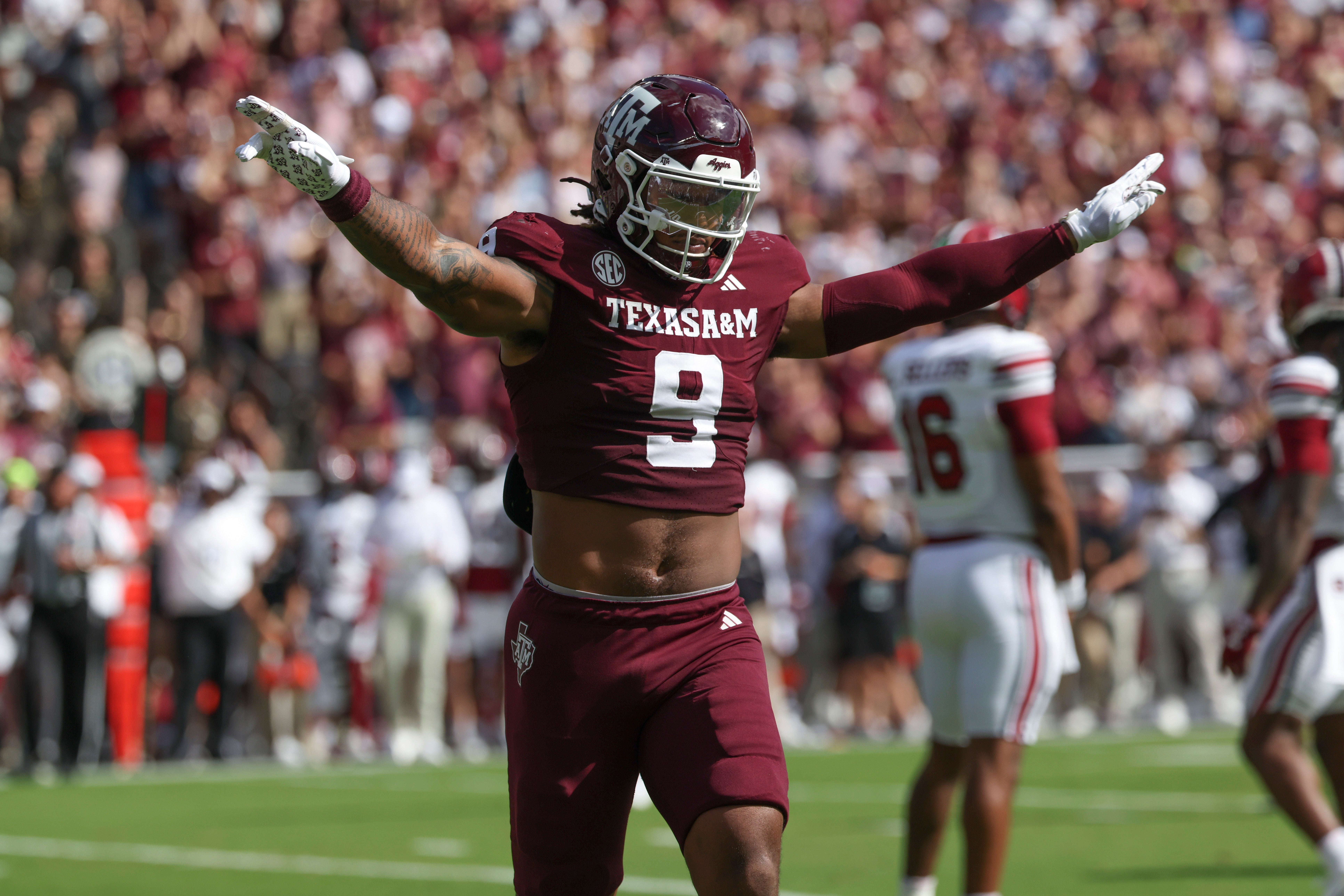 Nov 15, 2025; College Station, Texas, USA; Texas A&M Aggies defensive end Cashius Howell (9) reacts after a defensive play during the first quarter against the South Carolina Gamecocks at Kyle Field.