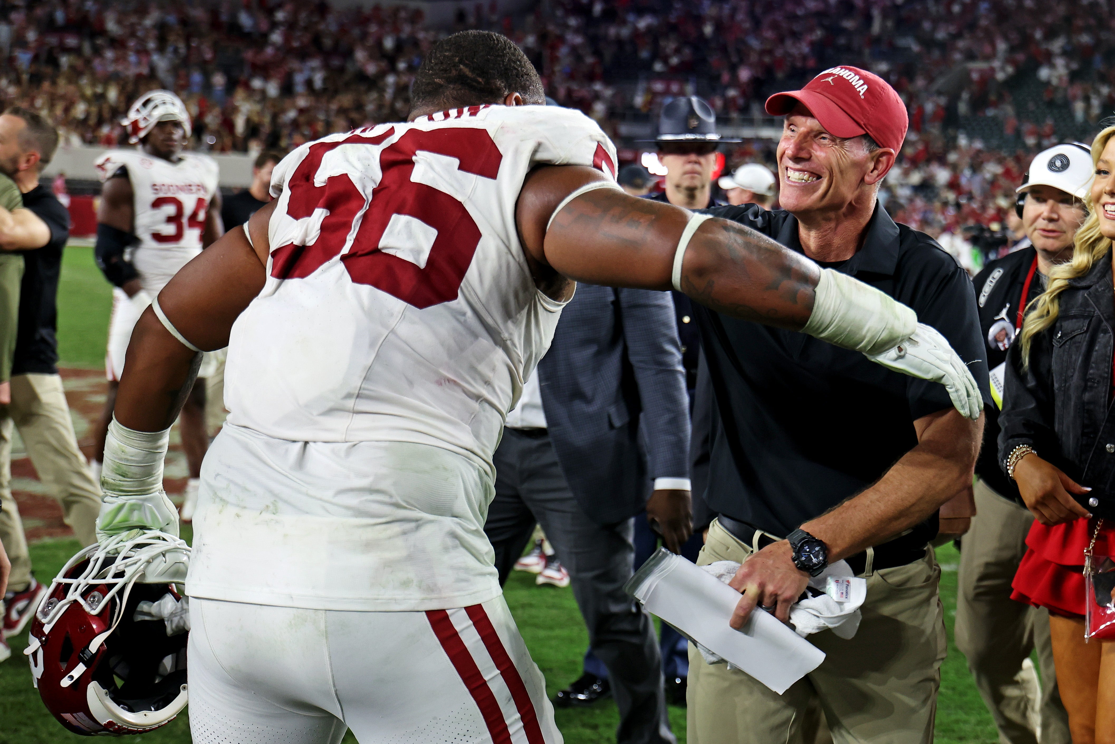 Nov 15, 2025; Tuscaloosa, Alabama, USA; Oklahoma Sooners head coach Brent Venables celebrates with defensive lineman Gracen Halton (56) after Oklahoma defeated the Alabama Crimson Tide 23-21 at Saban Field at Bryant-Denny Stadium.