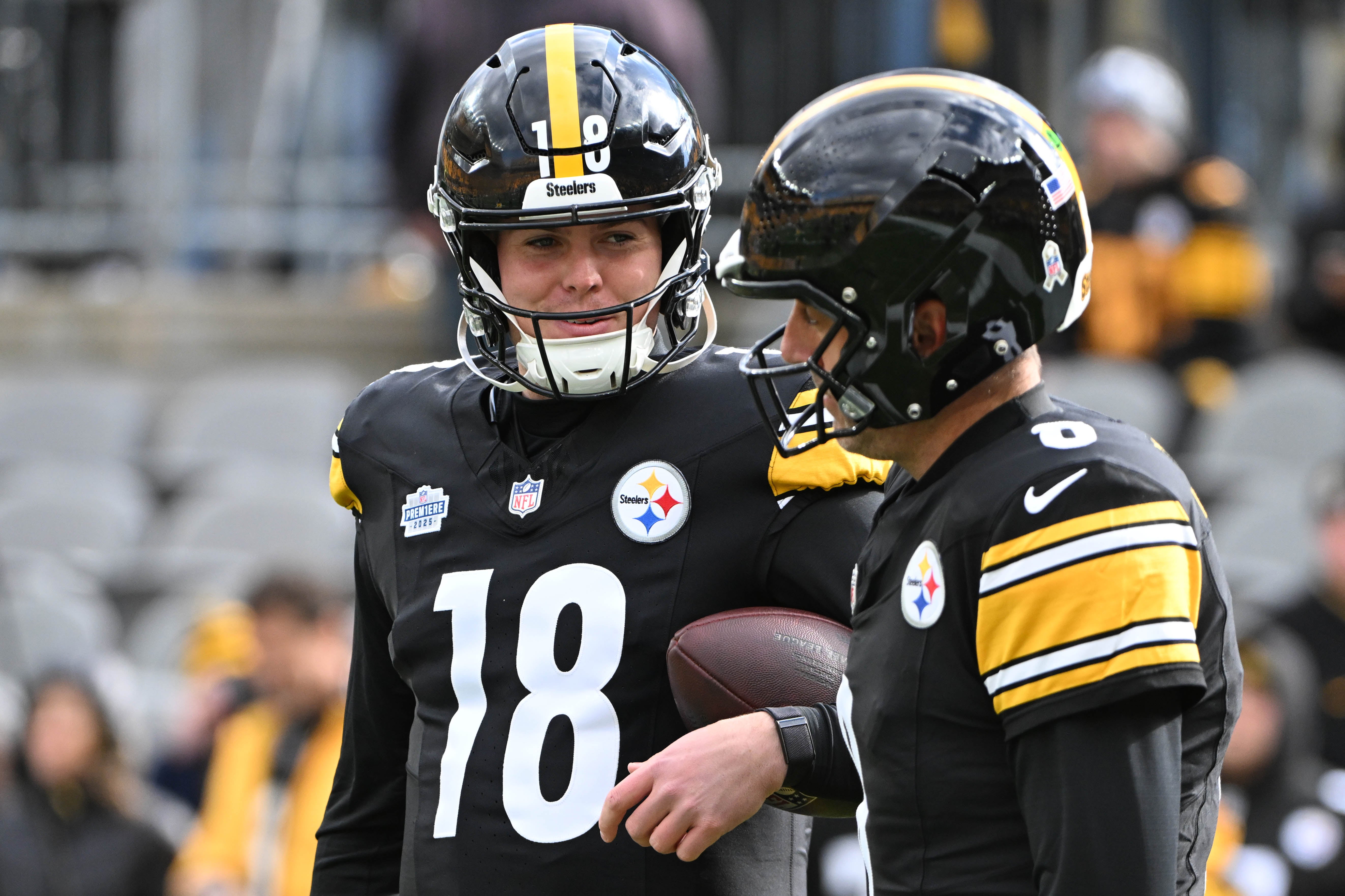 Nov 16, 2025; Pittsburgh, Pennsylvania, USA; Pittsburgh Steelers quarterback Will Howard (18) talks with quarterback Aaron Rodgers (8) before the game against the Cincinnati Bengals at Acrisure Stadium.