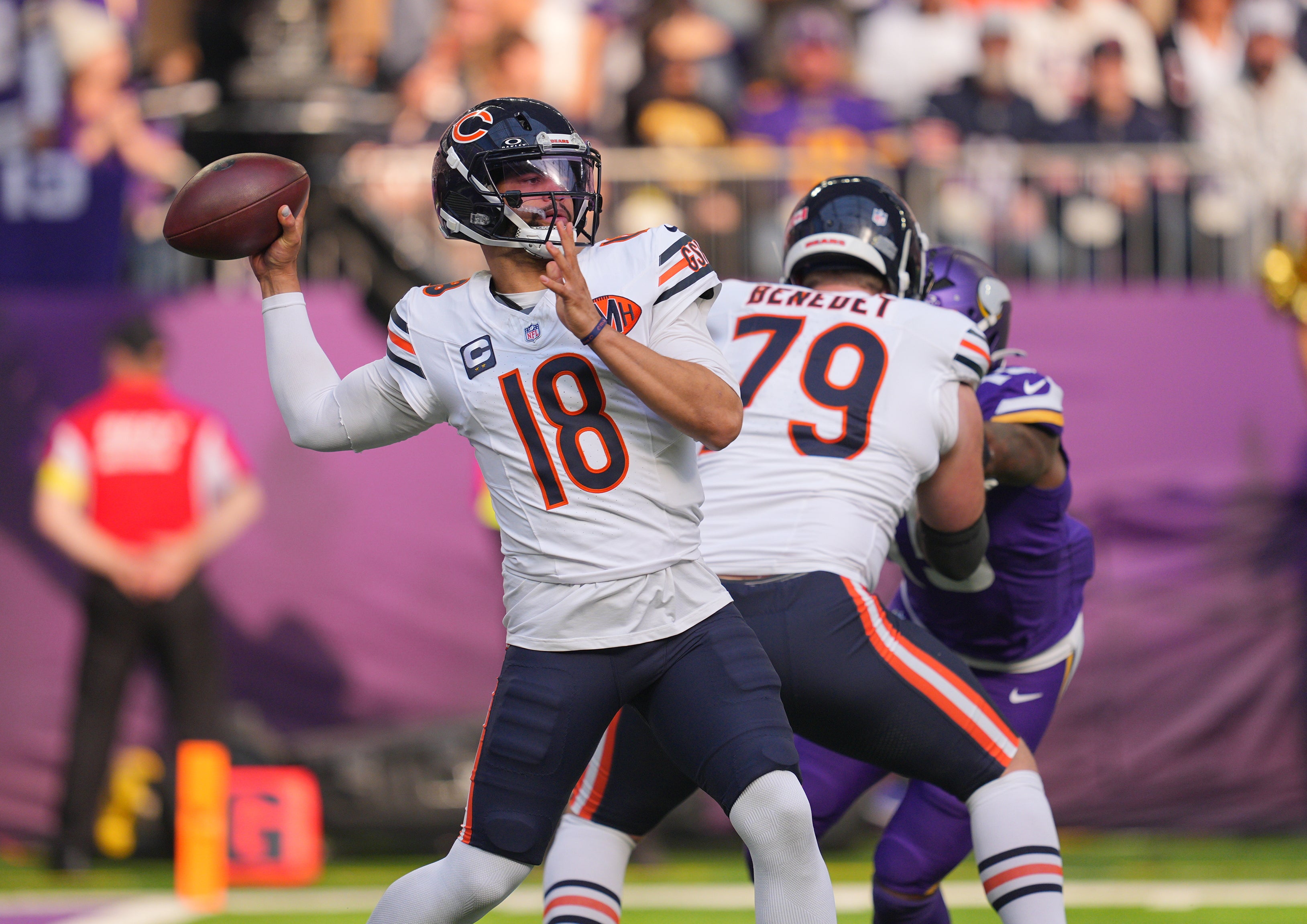 Nov 16, 2025; Minneapolis, Minnesota, USA; Chicago Bears quarterback Caleb Williams (18) throws downfield during the first quarter against the Minnesota Vikings at U.S. Bank Stadium.