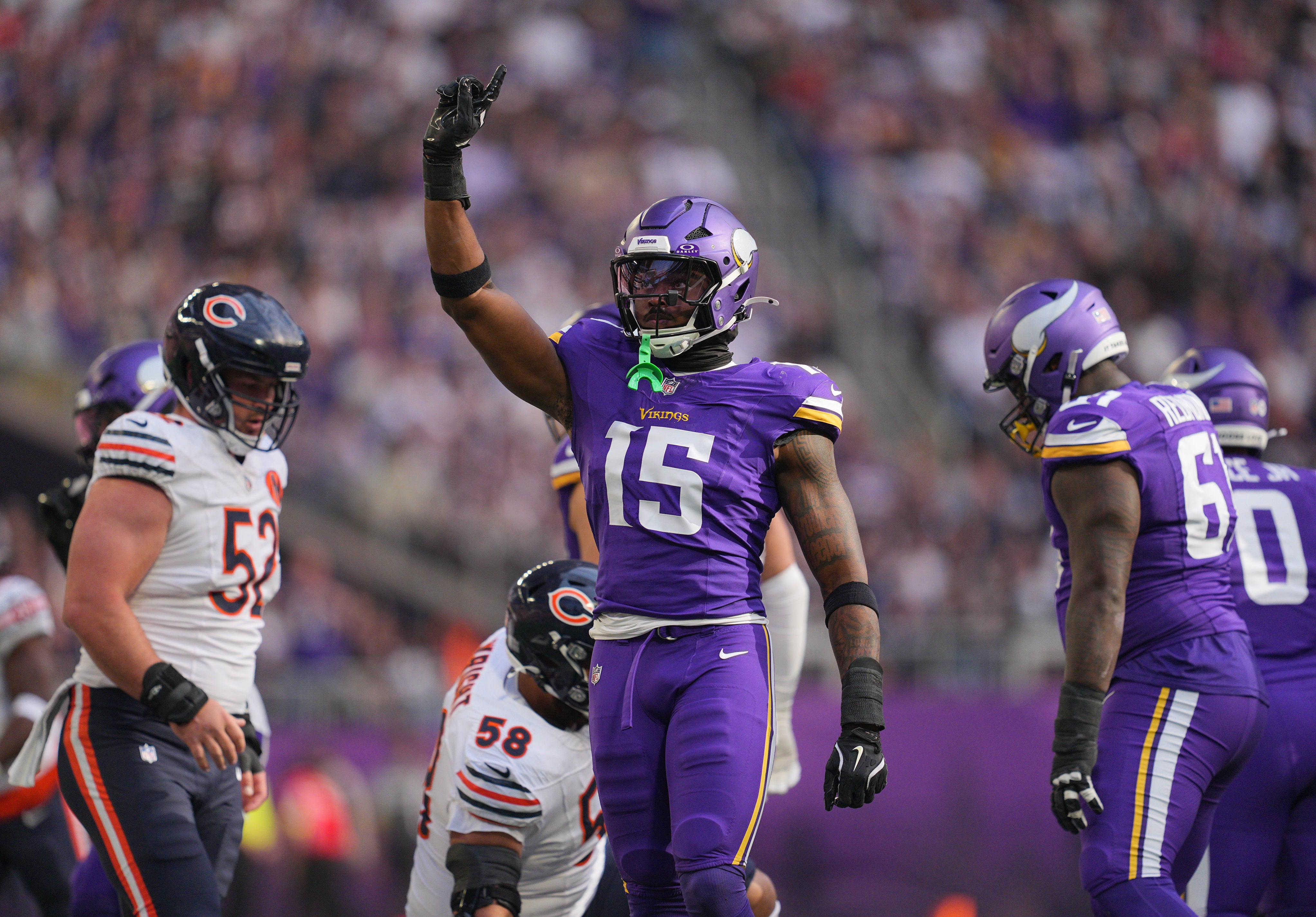 Nov 16, 2025; Minneapolis, Minnesota, USA; Minnesota Vikings linebacker Dallas Turner (15) reacts after a tackle during the first quarter against the Minnesota Vikings at U.S. Bank Stadium.