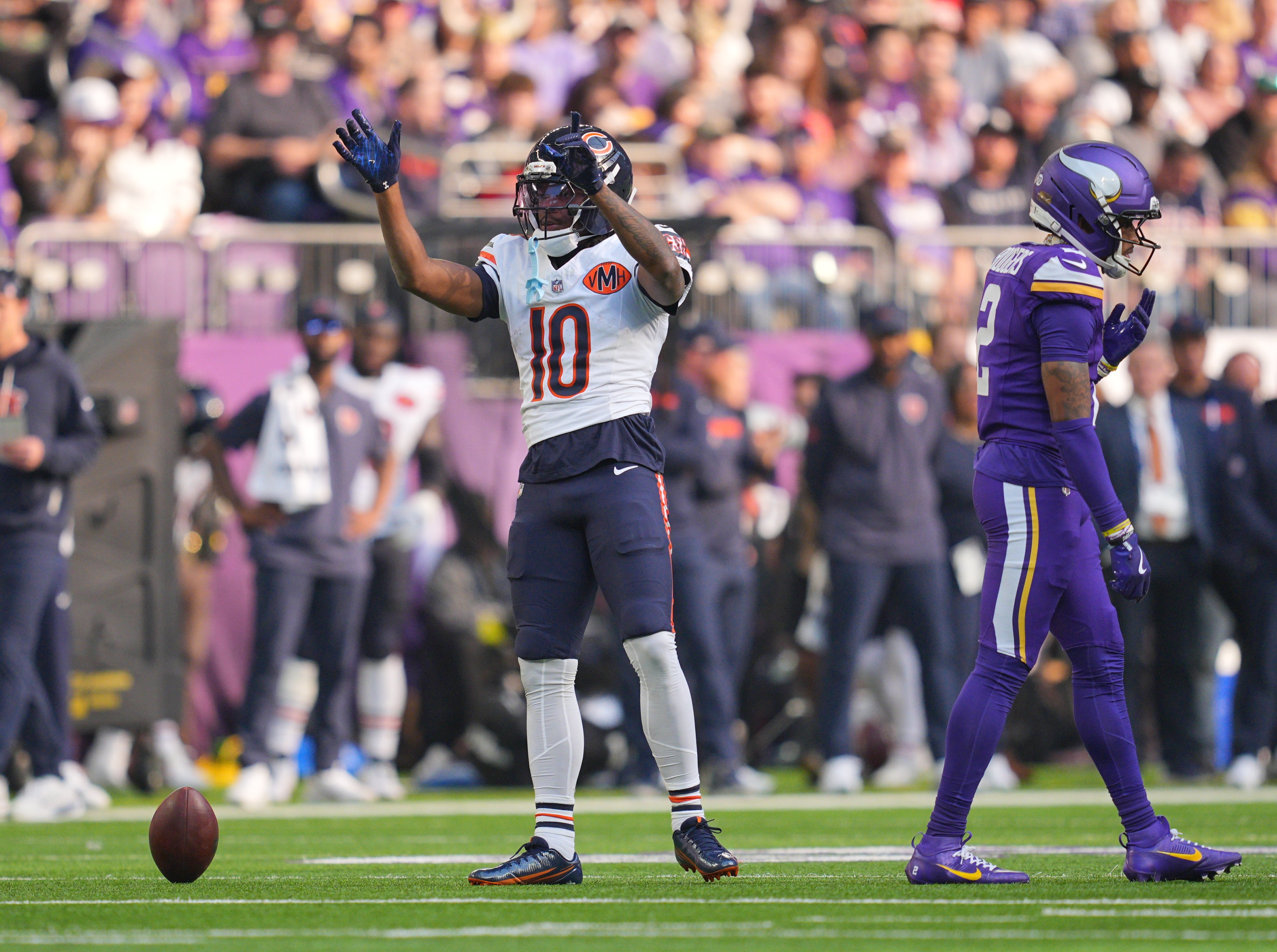 Nov 16, 2025; Minneapolis, Minnesota, USA; Chicago Bears wide receiver Luther Burden III (10) reacts after a run for a gain during the second quarter against the Minnesota Vikings at U.S. Bank Stadium.