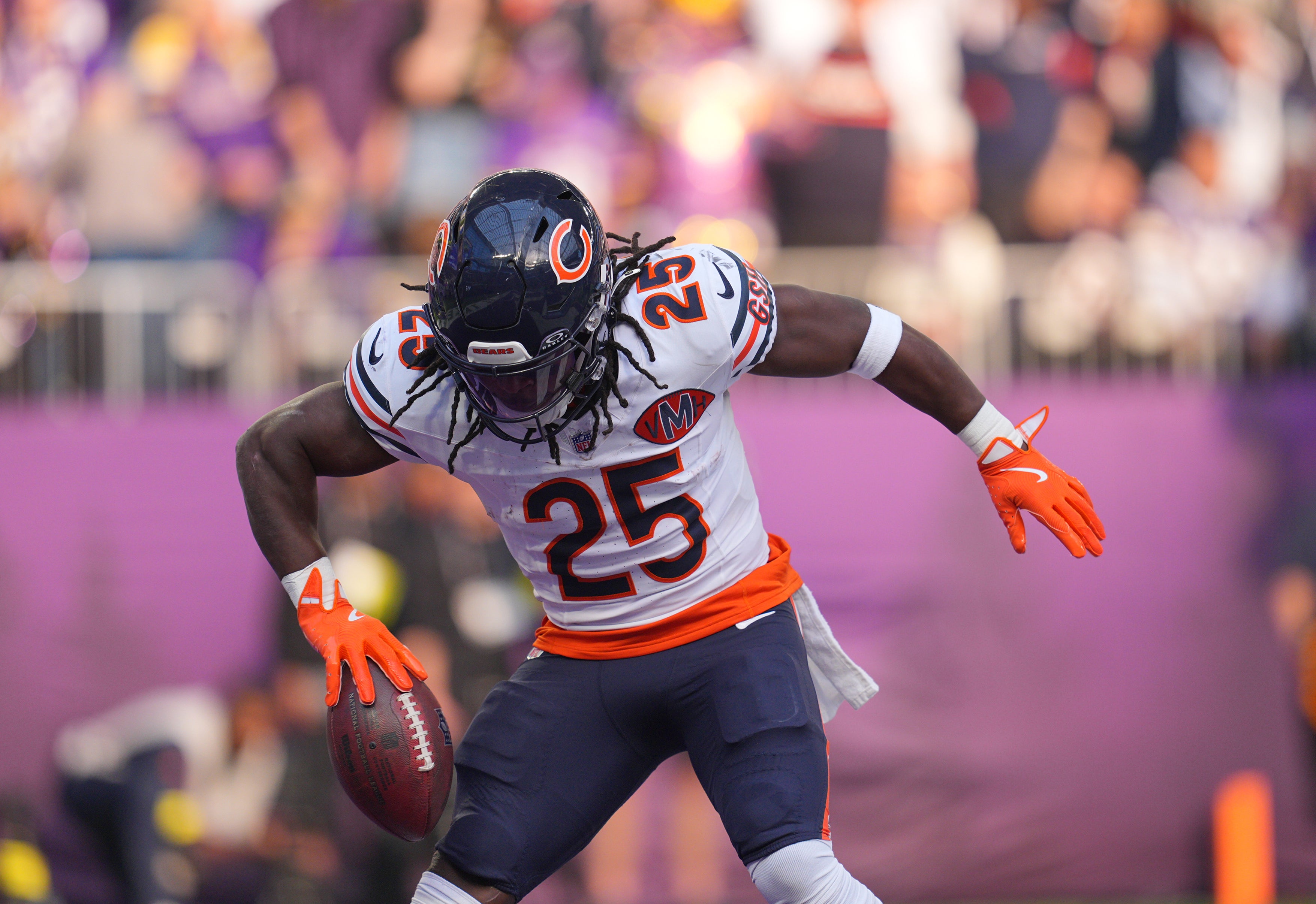 Nov 16, 2025; Minneapolis, Minnesota, USA; Chicago Bears running back Kyle Monangai (25) celebrates a touchdown during the second quarter against the Minnesota Vikings at U.S. Bank Stadium.