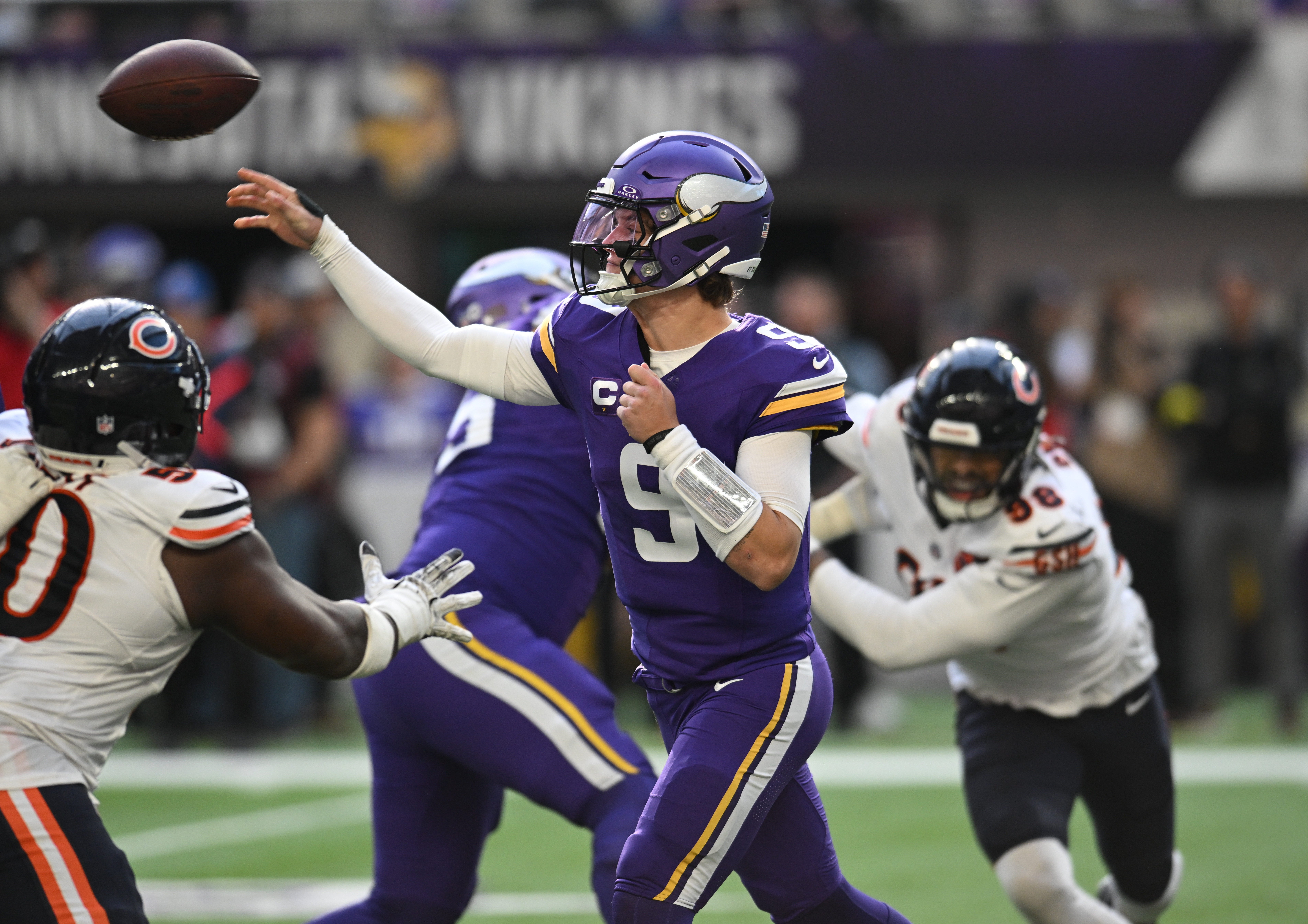 Nov 16, 2025; Minneapolis, Minnesota, USA; Minnesota Vikings quarterback J.J. McCarthy (9) throws downfield during the second quarter against the Chicago Bears at U.S. Bank Stadium.