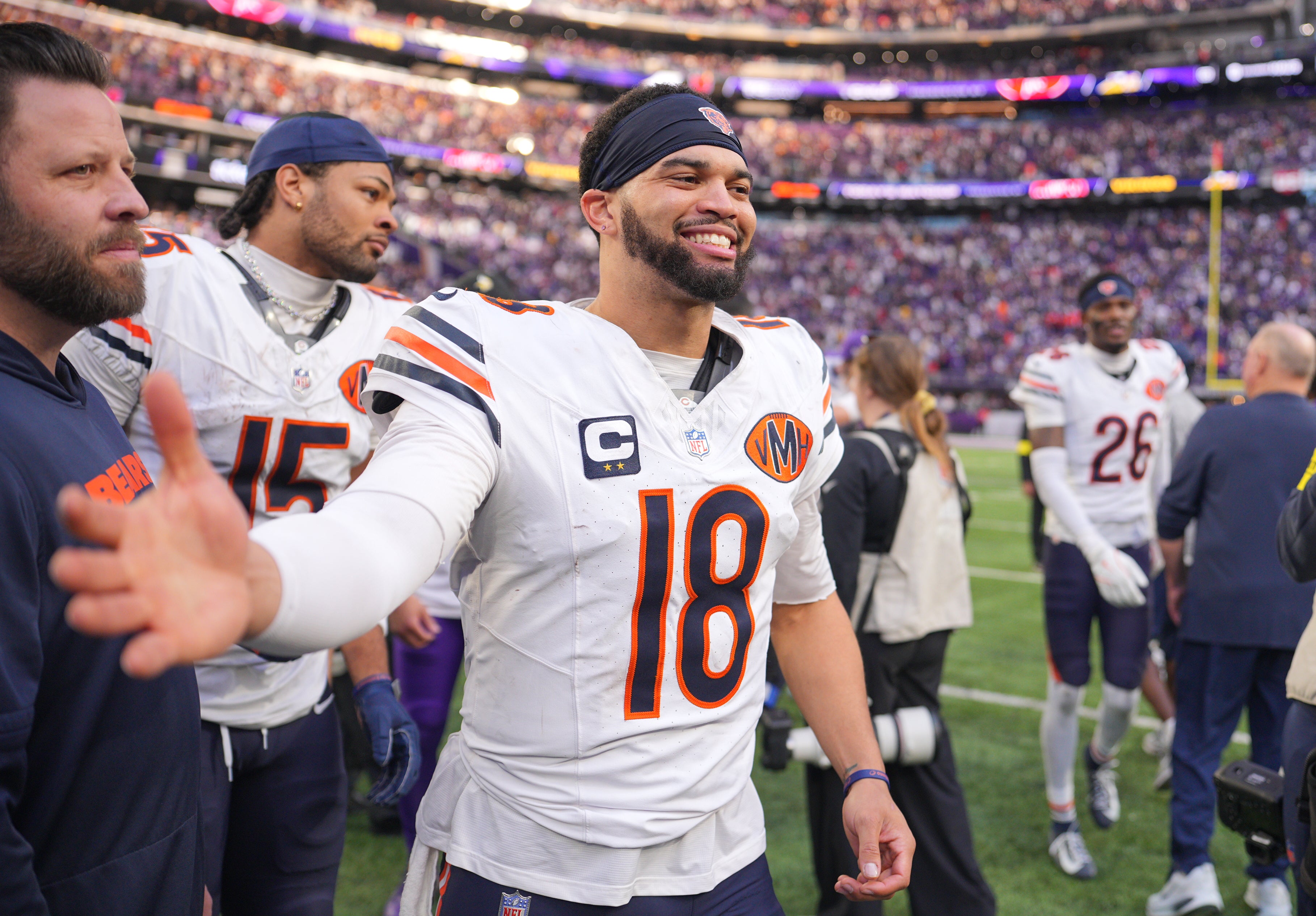 Nov 16, 2025; Minneapolis, Minnesota, USA; Chicago Bears quarterback Caleb Williams (18) greets a Minnesota Vikings player following a game at U.S. Bank Stadium.